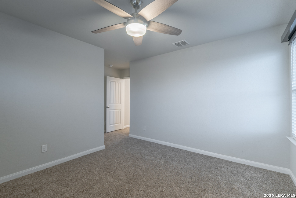 10230 Midsummer Meadow Converse, TX 78109 - Photo 31 of 37 an empty room with a fan and a fan
