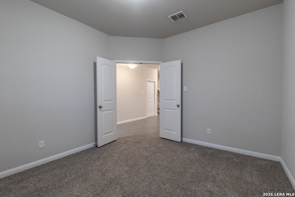 10230 Midsummer Meadow Converse, TX 78109 - Photo 4 of 37 an empty room with closet area