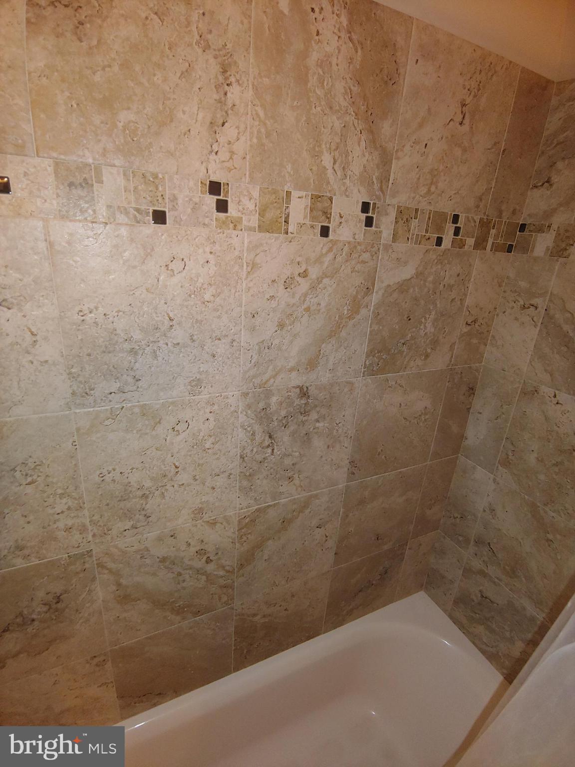 547 Joppa Farm Road Joppa, MD 21085 - Photo 17 of 35 HALL BATH WITH GORGEOUS CERAMIC WALL TUB SURROUND
