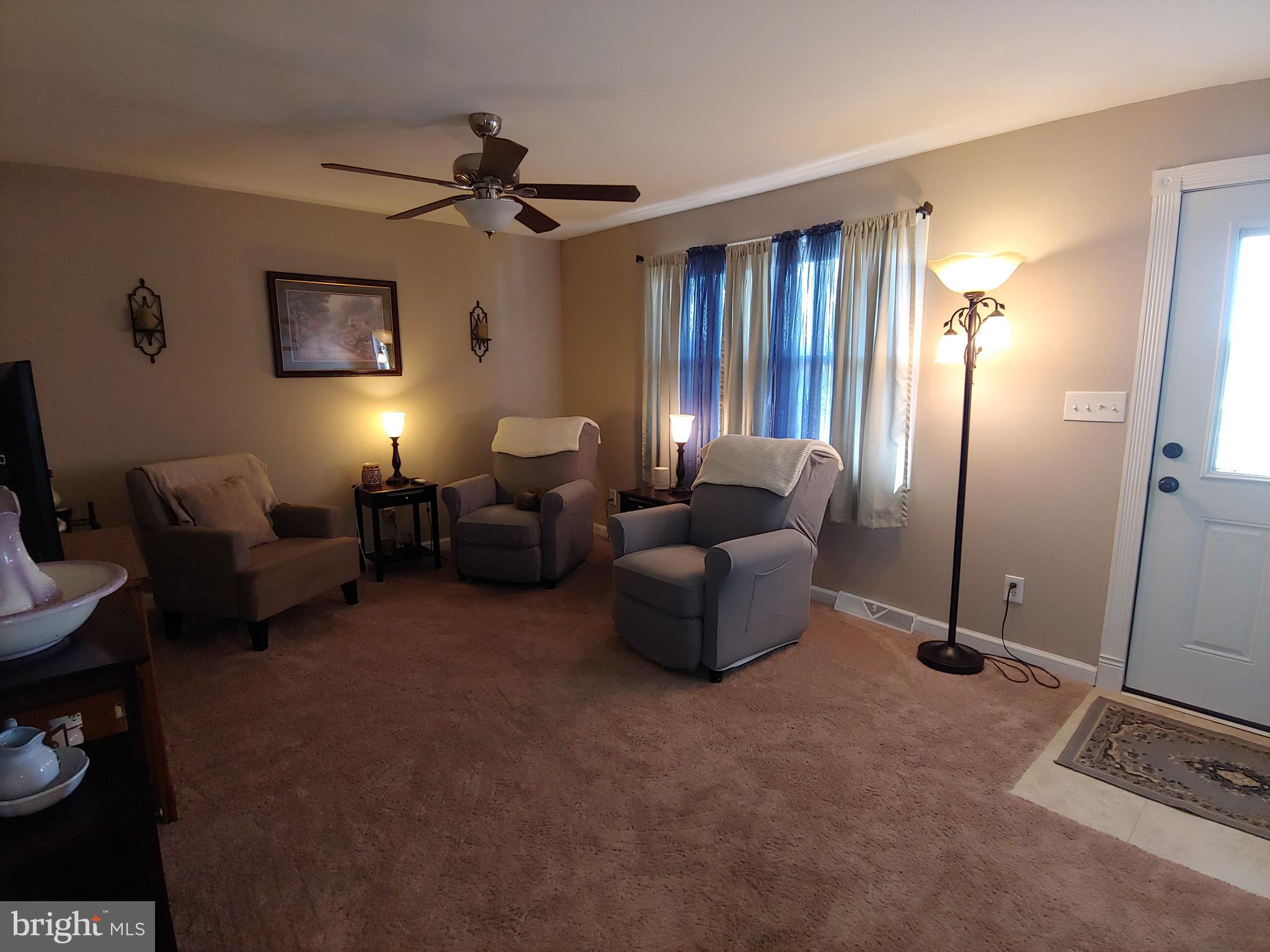 547 Joppa Farm Road Joppa, MD 21085 - Photo 3 of 35 LIVING ROOM WITH CEILING FAN & LIGHT ATTACHMENT