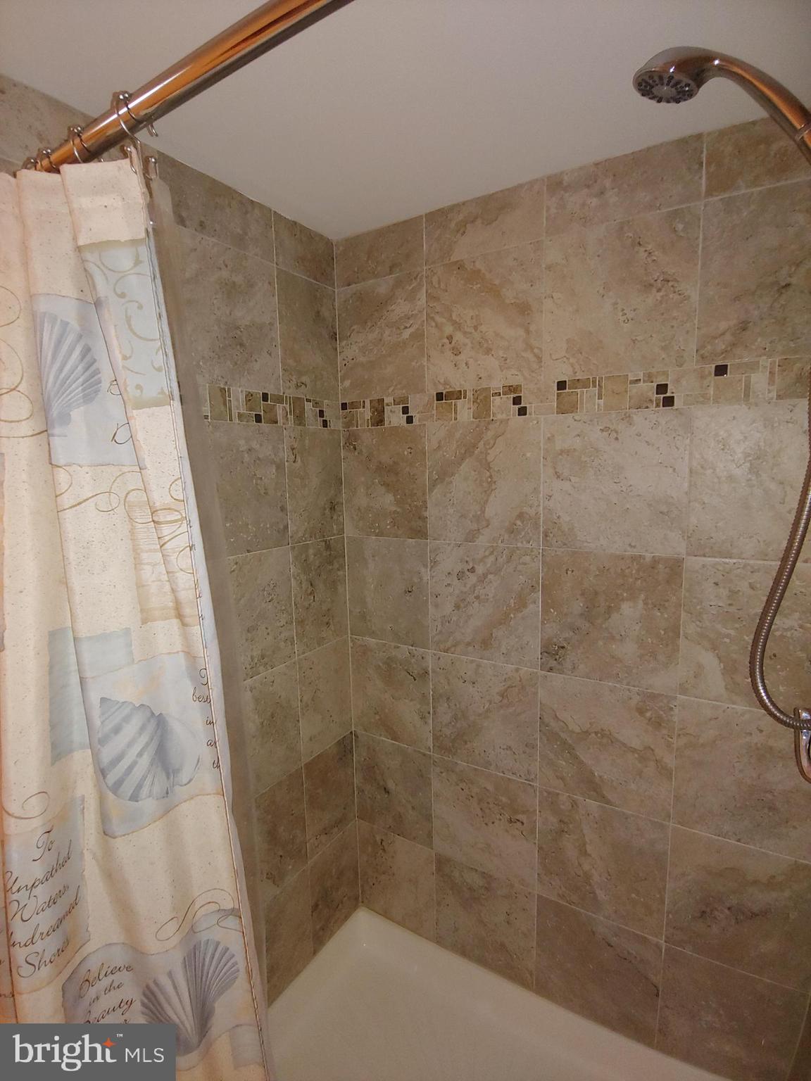 547 Joppa Farm Road Joppa, MD 21085 - Photo 23 of 35 BEAUTIFUL SHOWER SURROUND IN LOWER LEVEL BATHROOM
