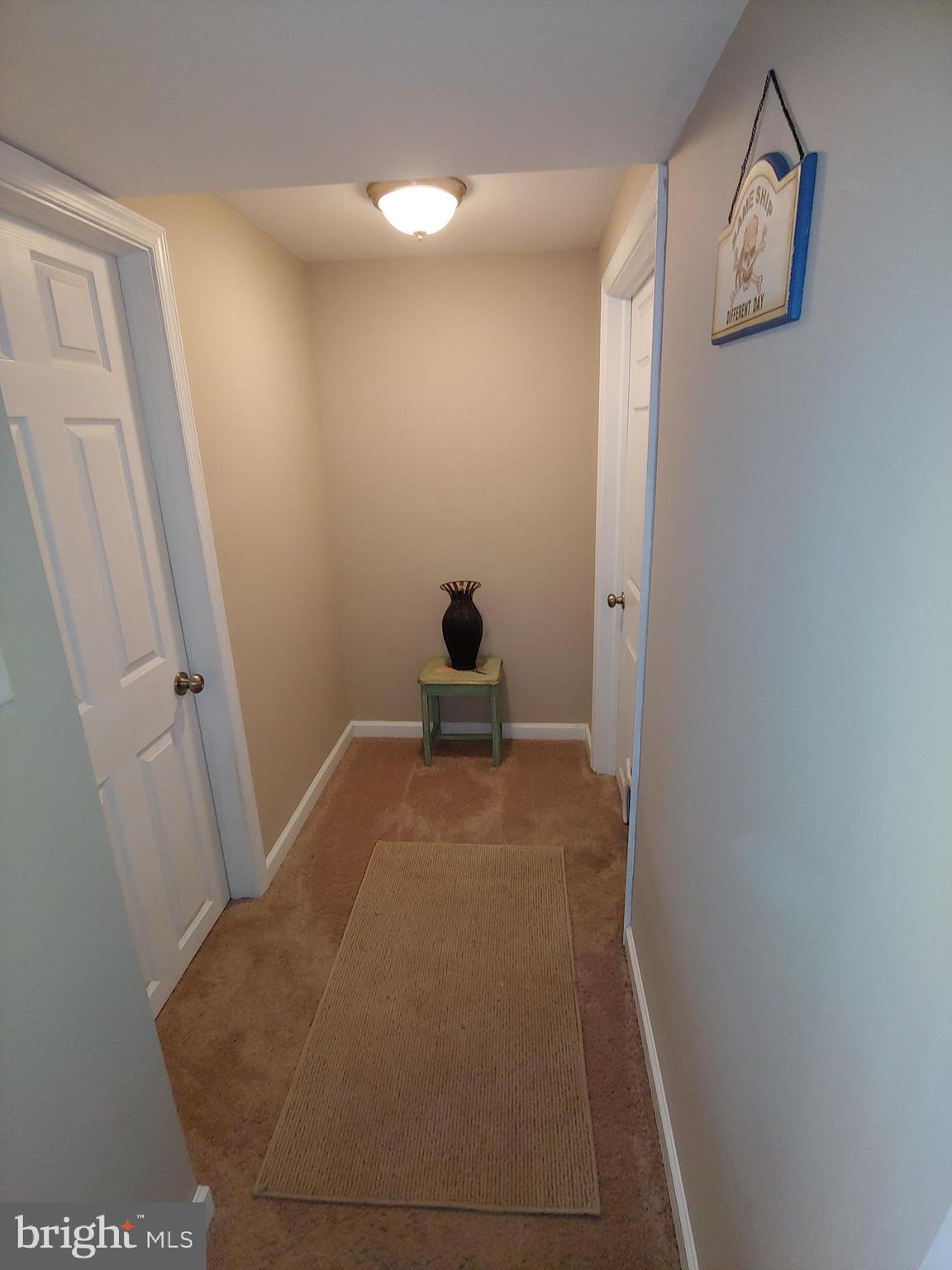547 Joppa Farm Road Joppa, MD 21085 - Photo 24 of 35 LOWER LEVEL HALL TO BATH & LAUNDRY ROOMS