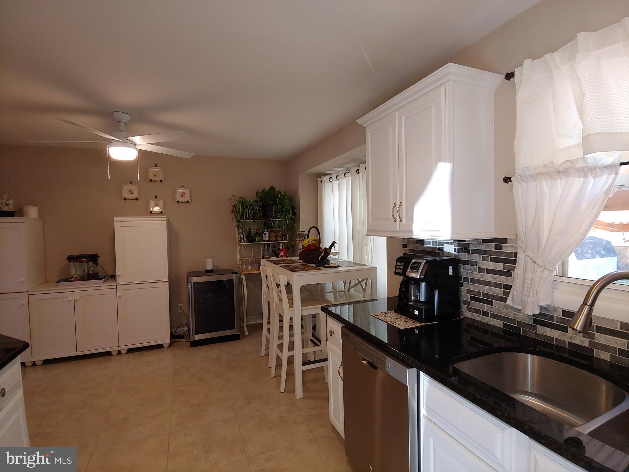 547 Joppa Farm Road Joppa, MD 21085 - Photo 6 of 35 KITCHEN HAS BEAUTIFUL BACKSPLASH
