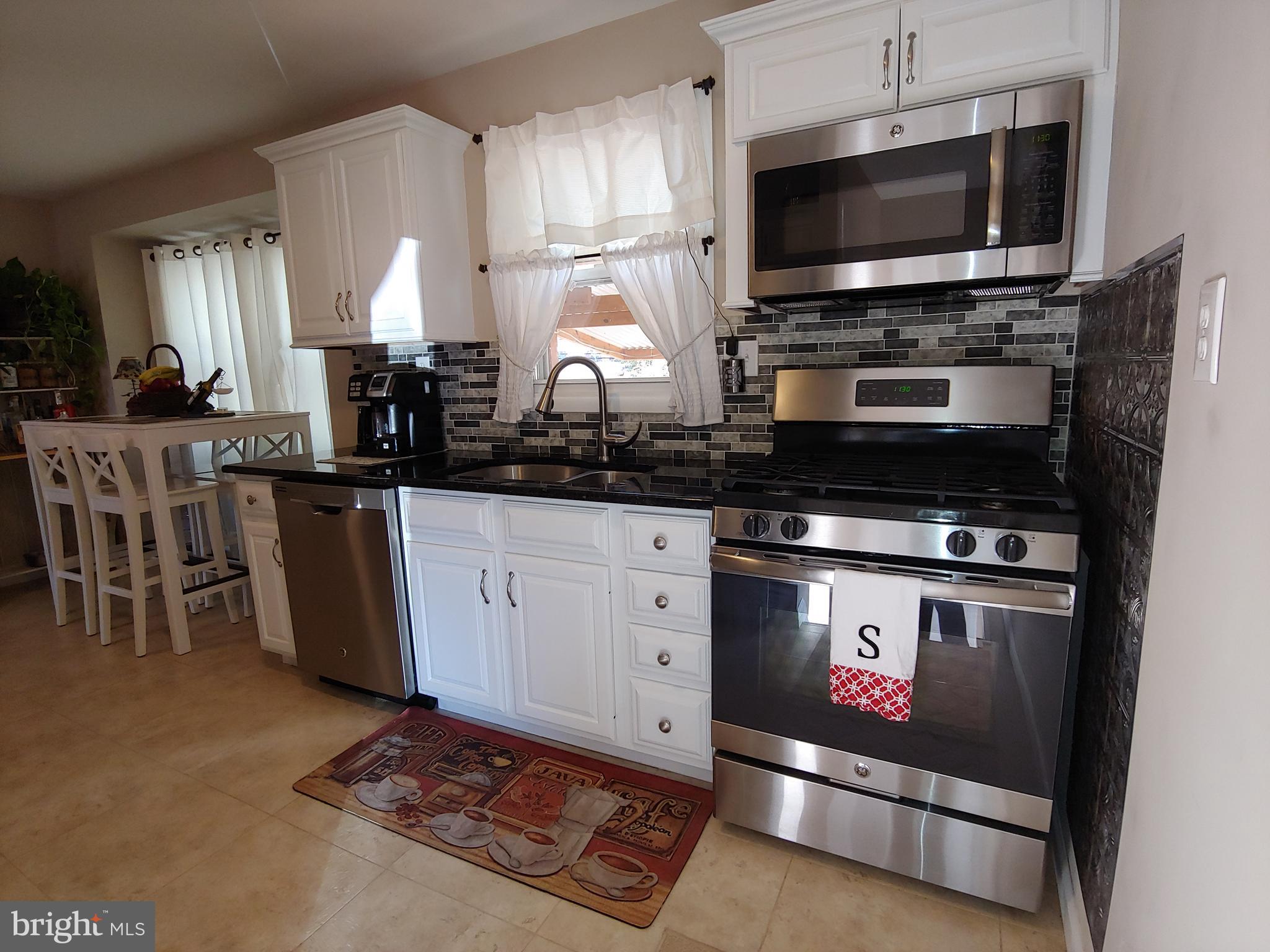 547 Joppa Farm Road Joppa, MD 21085 - Photo 7 of 35 STAINLESS APPLIANCES & GRANITE COUNTERS