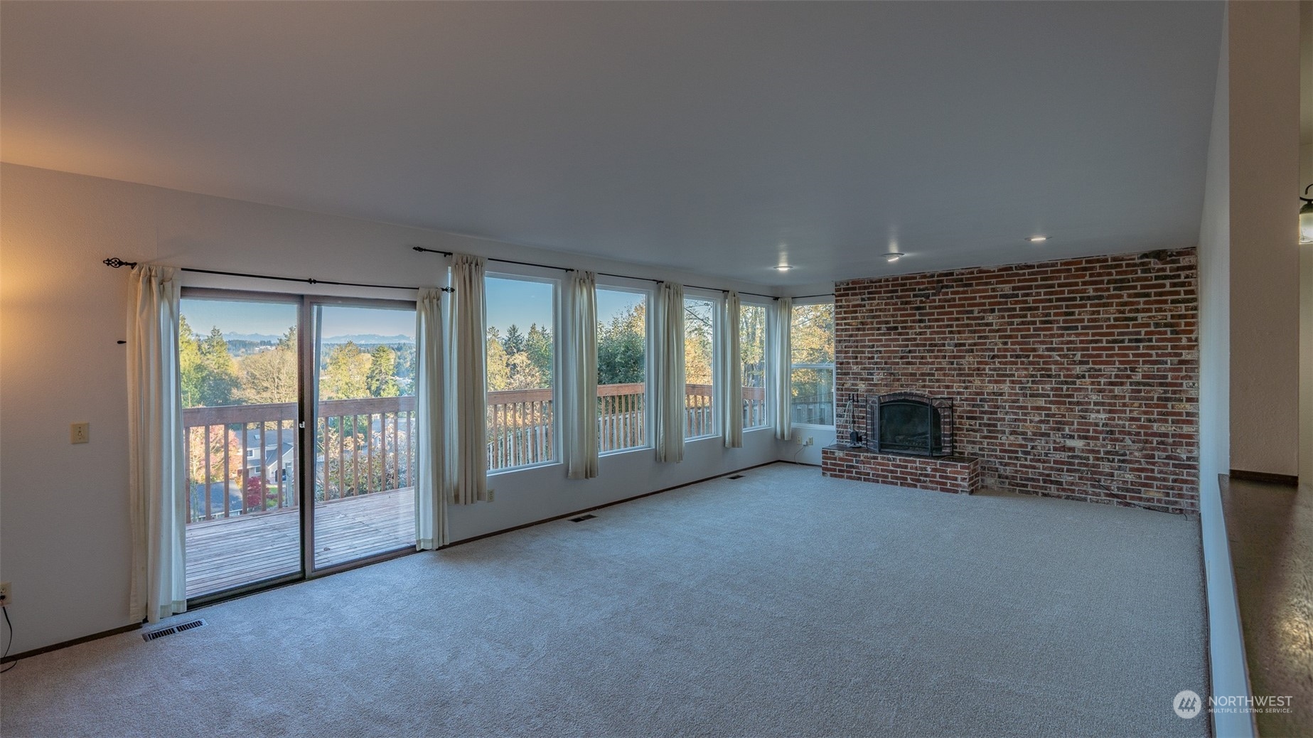 22527 4th Avenue Southeast Bothell, WA 98021 - Photo 11 of 40 a view of an empty room with a fireplace