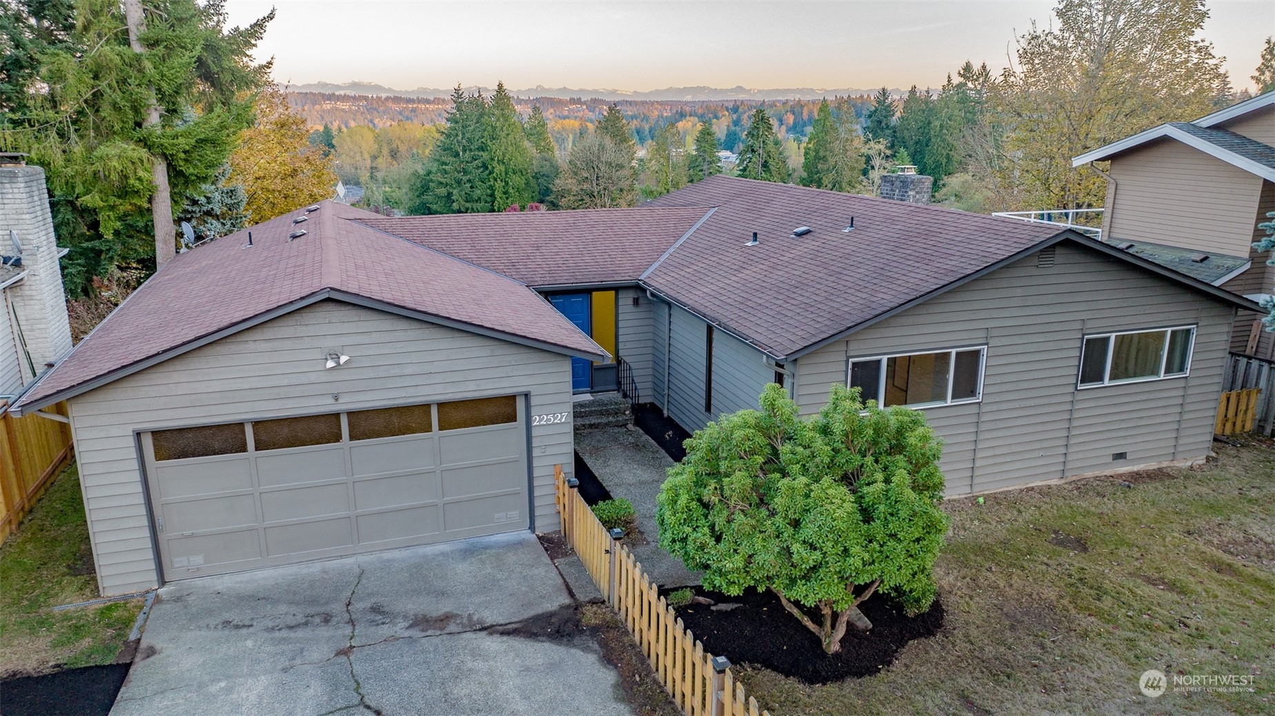 22527 4th Avenue Southeast Bothell, WA 98021 - Photo 2 of 40 a aerial view of a house with a yard and potted plants