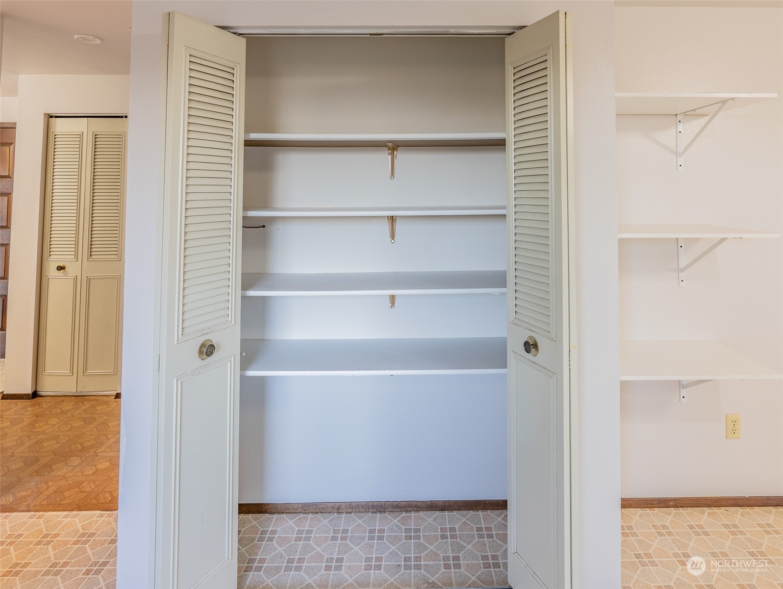 22527 4th Avenue Southeast Bothell, WA 98021 - Photo 23 of 40 a view of walk in closet with empty racks