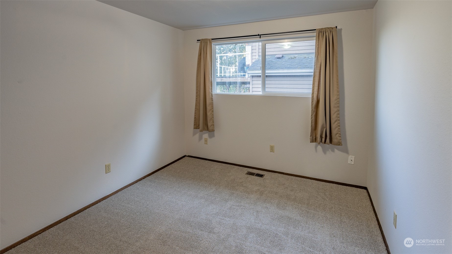 22527 4th Avenue Southeast Bothell, WA 98021 - Photo 24 of 40 an empty room with a window