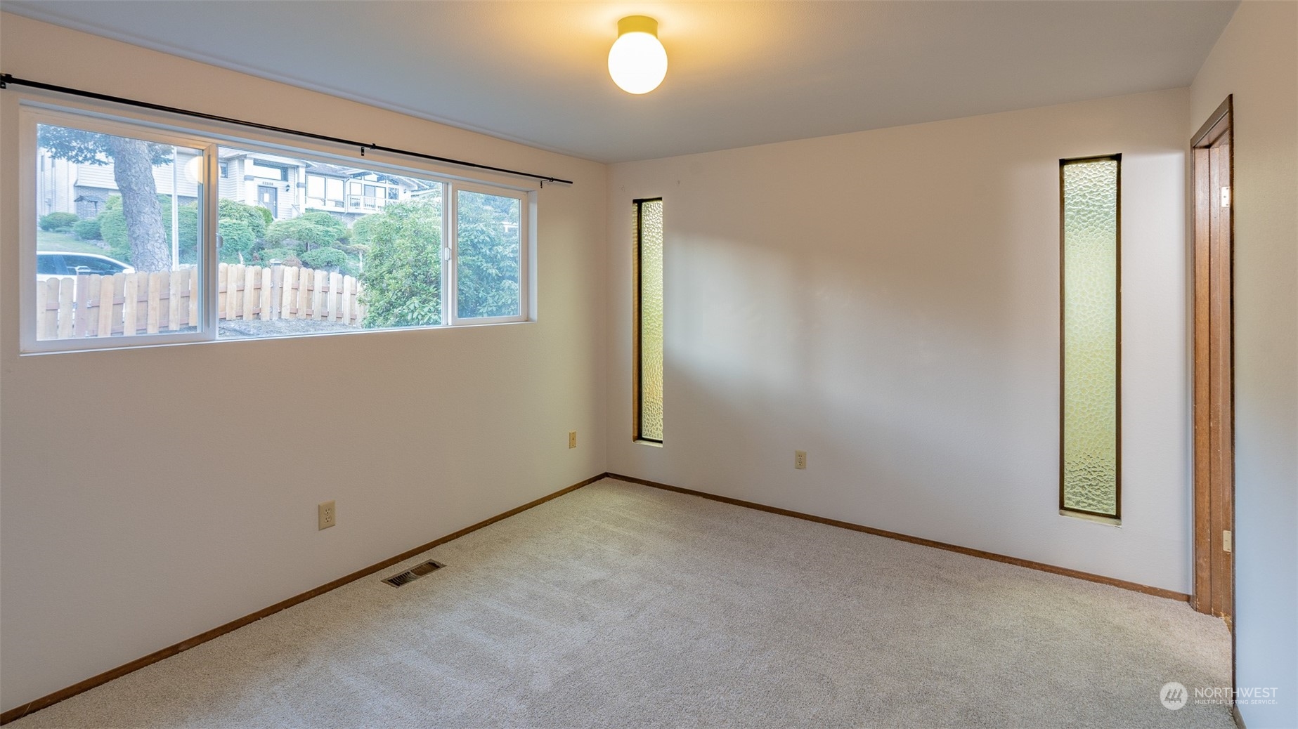 22527 4th Avenue Southeast Bothell, WA 98021 - Photo 25 of 40 an empty room with windows and entrance