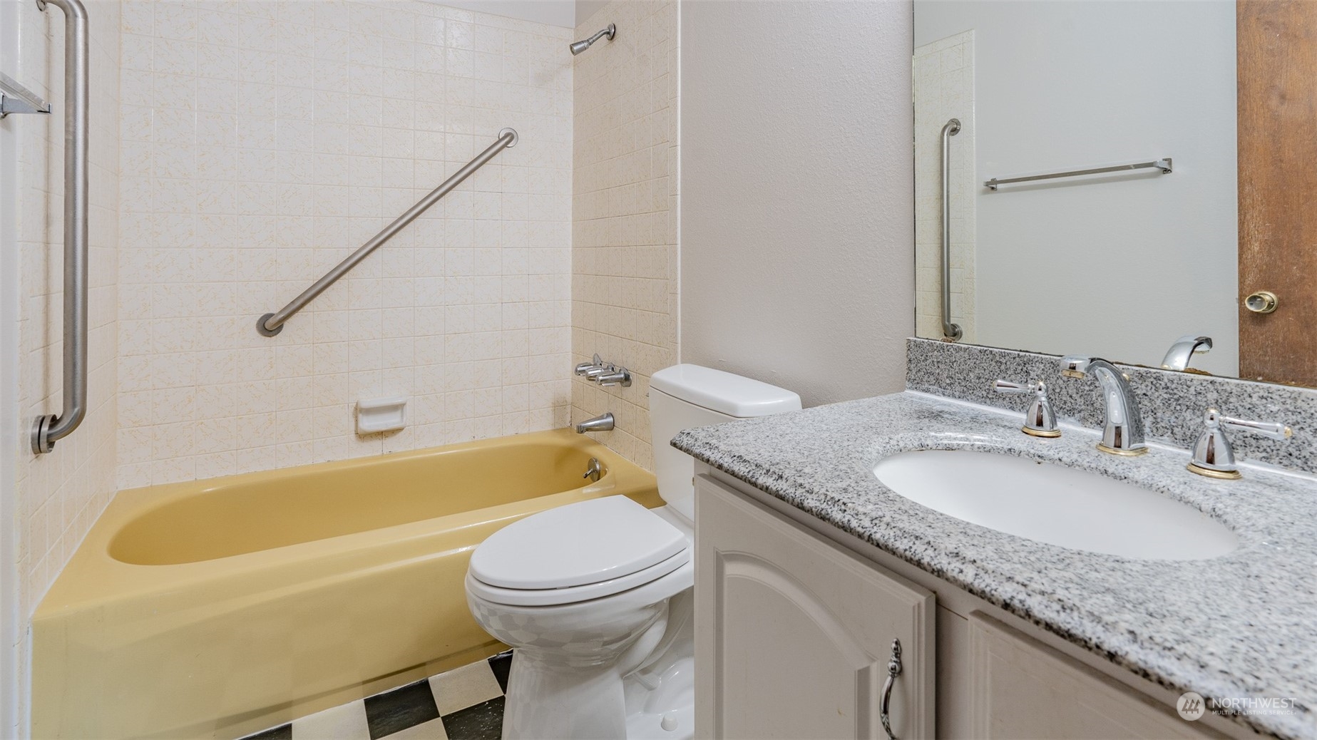22527 4th Avenue Southeast Bothell, WA 98021 - Photo 26 of 40 a bathroom with a granite countertop sink and a mirror