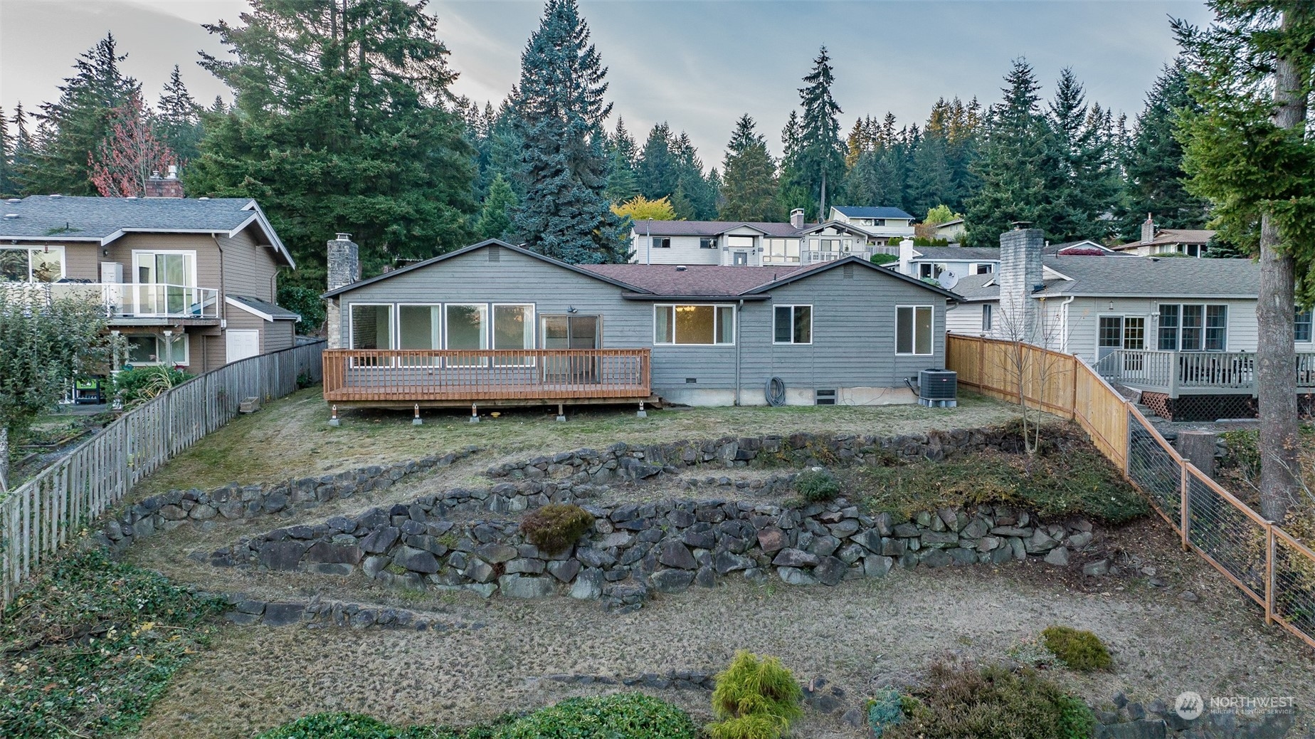 22527 4th Avenue Southeast Bothell, WA 98021 - Photo 5 of 40 a view of a house with a yard and large trees