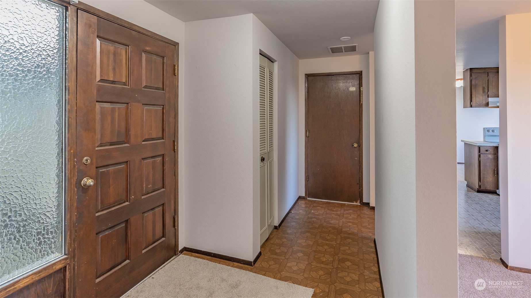 22527 4th Avenue Southeast Bothell, WA 98021 - Photo 10 of 40 a view of a kitchen from the hallway