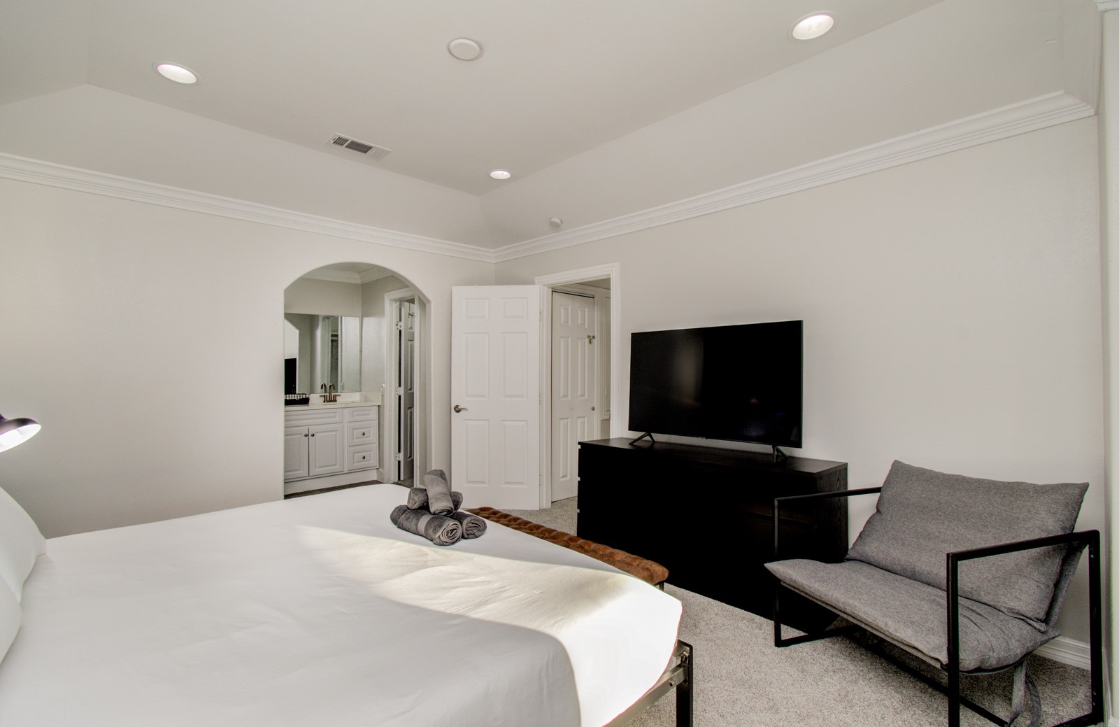 8623 Parasol Lane Houston, TX 77064 - Photo 18 of 50 a bedroom with a bed and a flat screen tv