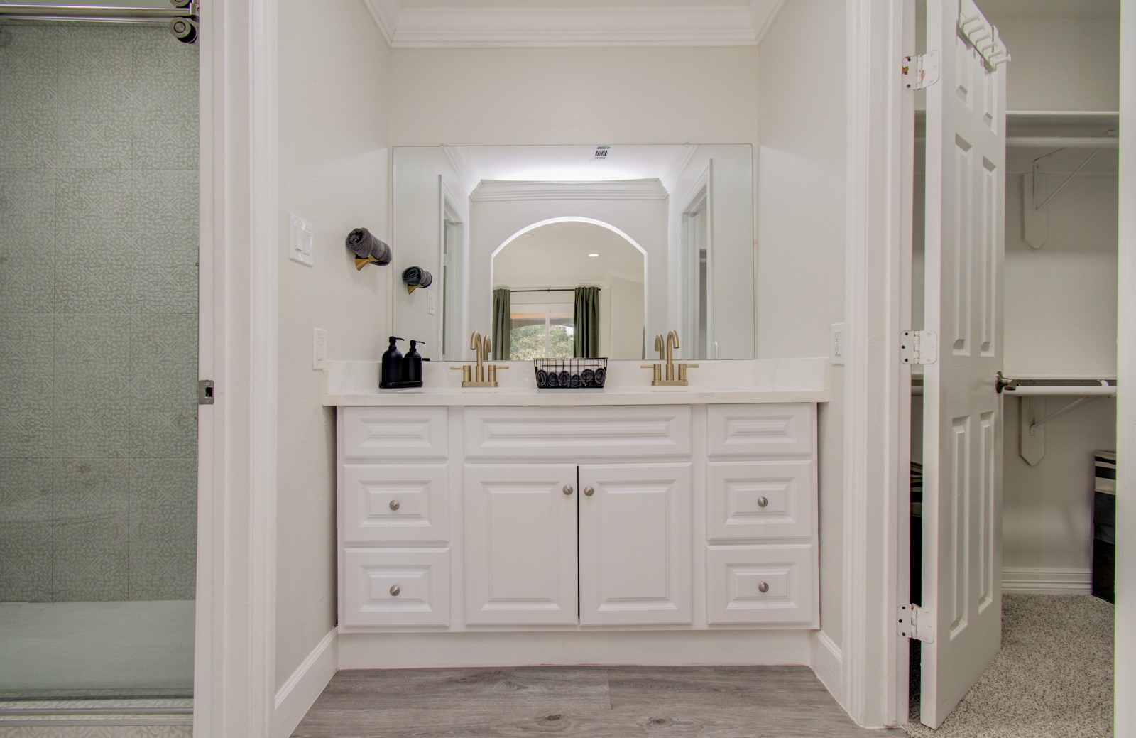 8623 Parasol Lane Houston, TX 77064 - Photo 20 of 50 a bathroom with a sink and a mirror