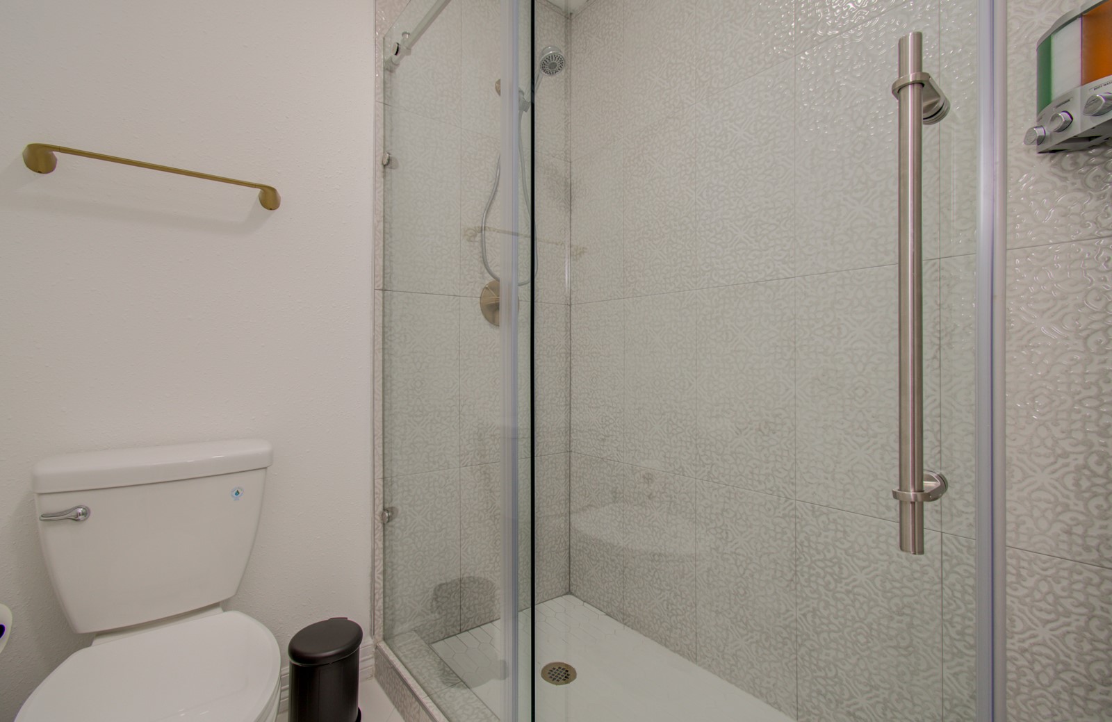 8623 Parasol Lane Houston, TX 77064 - Photo 21 of 50 a bathroom with a toilet and a shower