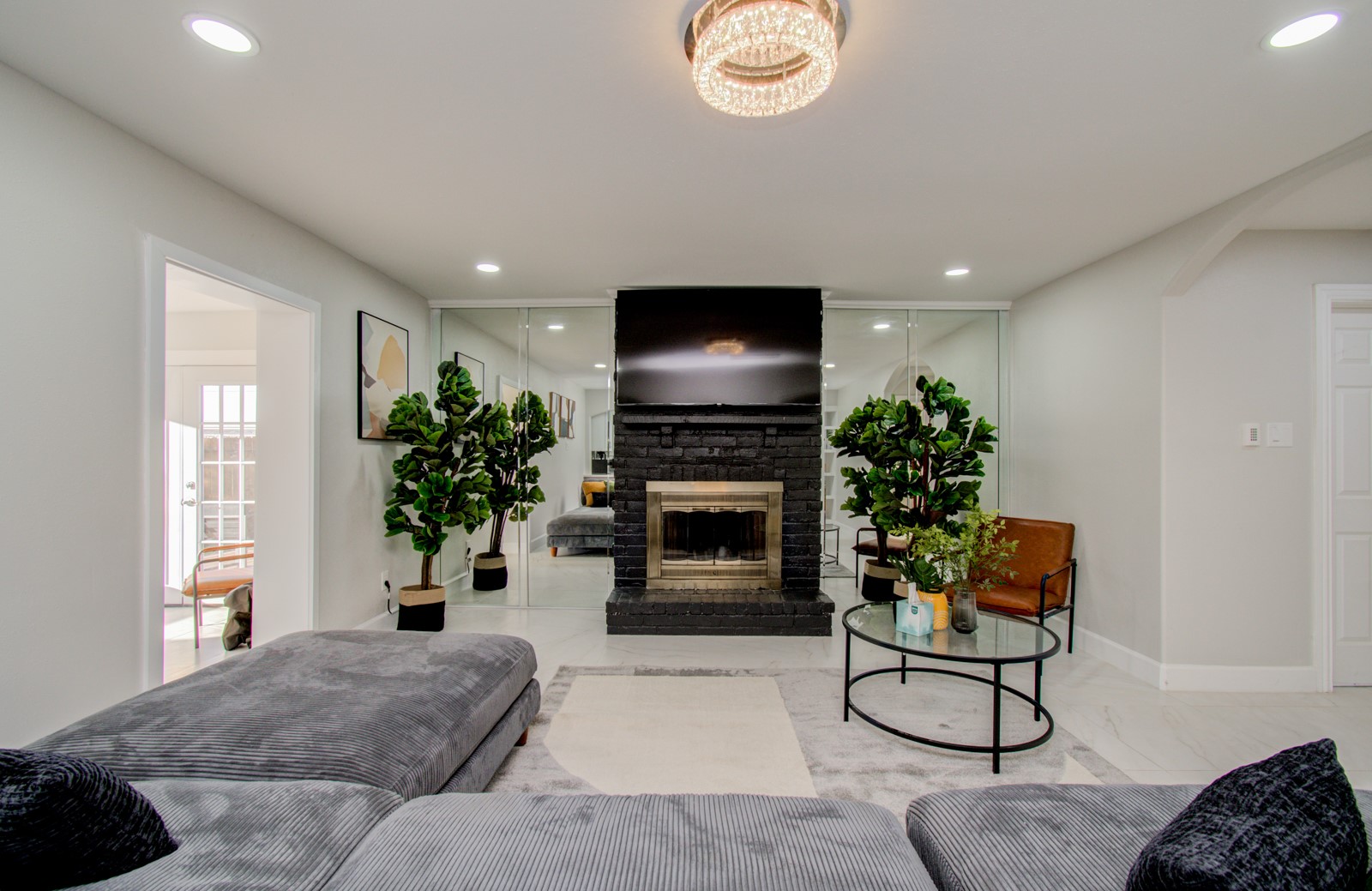 8623 Parasol Lane Houston, TX 77064 - Photo 3 of 50 a living room with furniture potted plant and a fireplace
