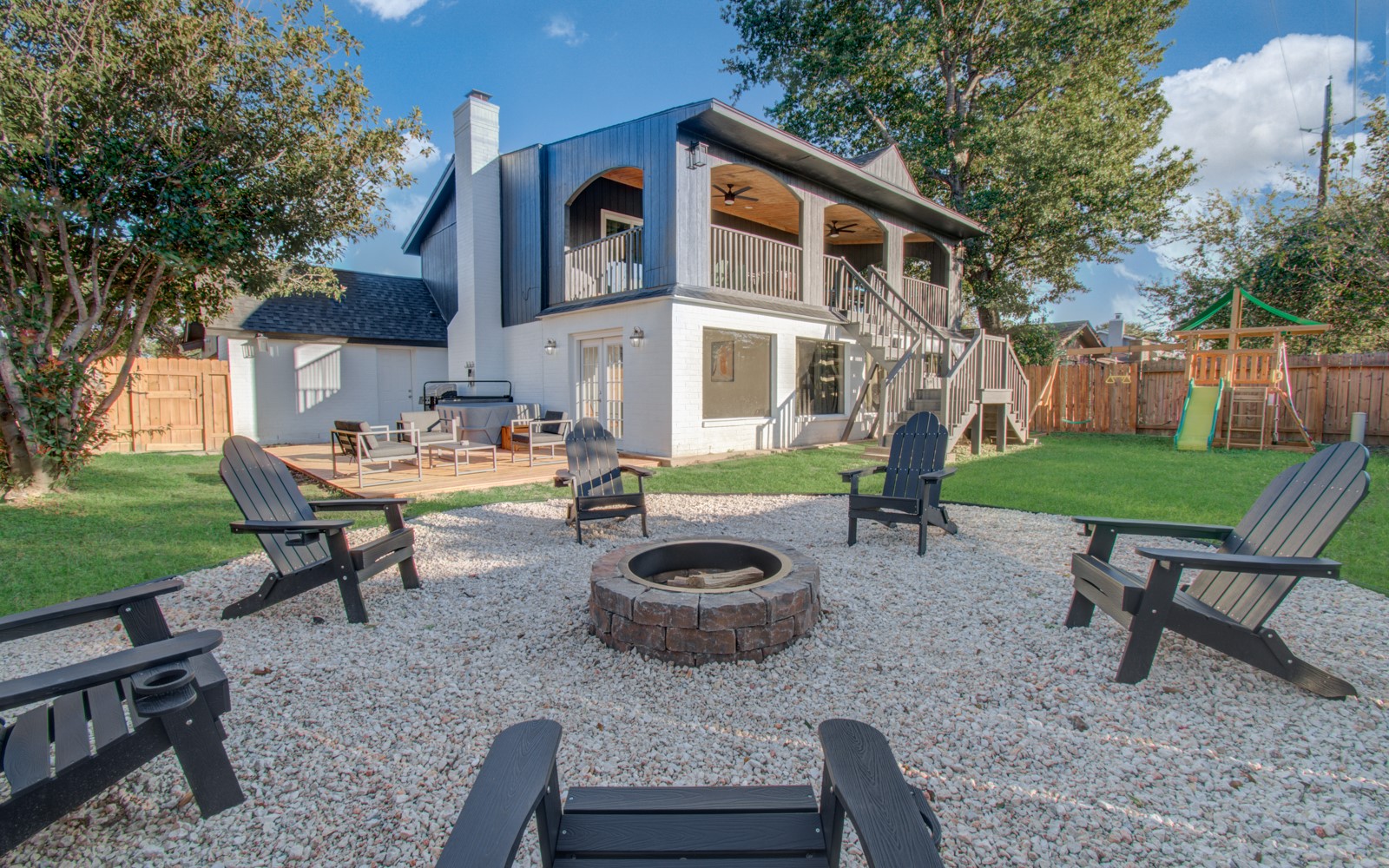 8623 Parasol Lane Houston, TX 77064 - Photo 38 of 50 a view of a backyard with table and chairs