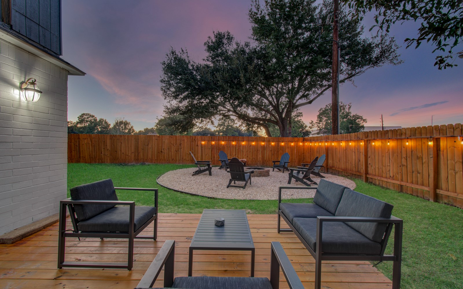 8623 Parasol Lane Houston, TX 77064 - Photo 45 of 50 a view of a chairs and table in the back yard of the house