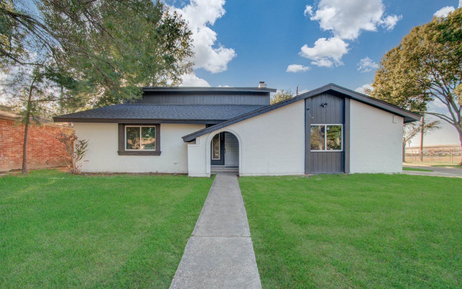 8623 Parasol Lane Houston, TX 77064 - Photo 50 of 50 a front view of a house with garden