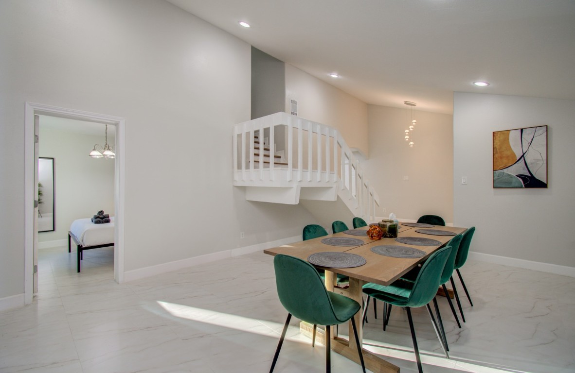 8623 Parasol Lane Houston, TX 77064 - Photo 6 of 50 a view of a dining room with furniture and wooden floor