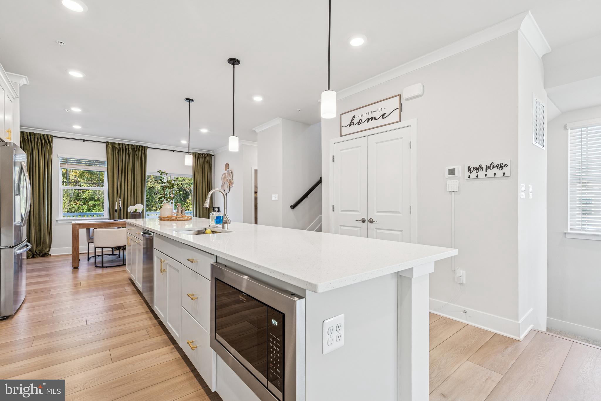 2218 Partin Road Baltimore, MD 21244 - Photo 12 of 62 a large kitchen with kitchen island a large island in it