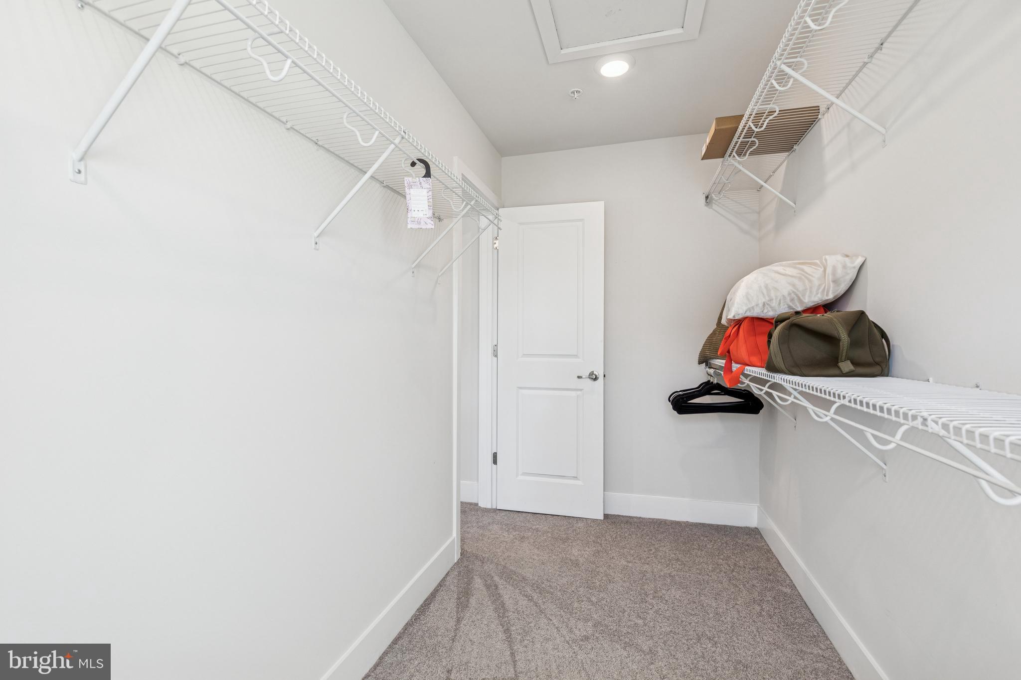 2218 Partin Road Baltimore, MD 21244 - Photo 26 of 62 a view of storage and utility room with empty racks