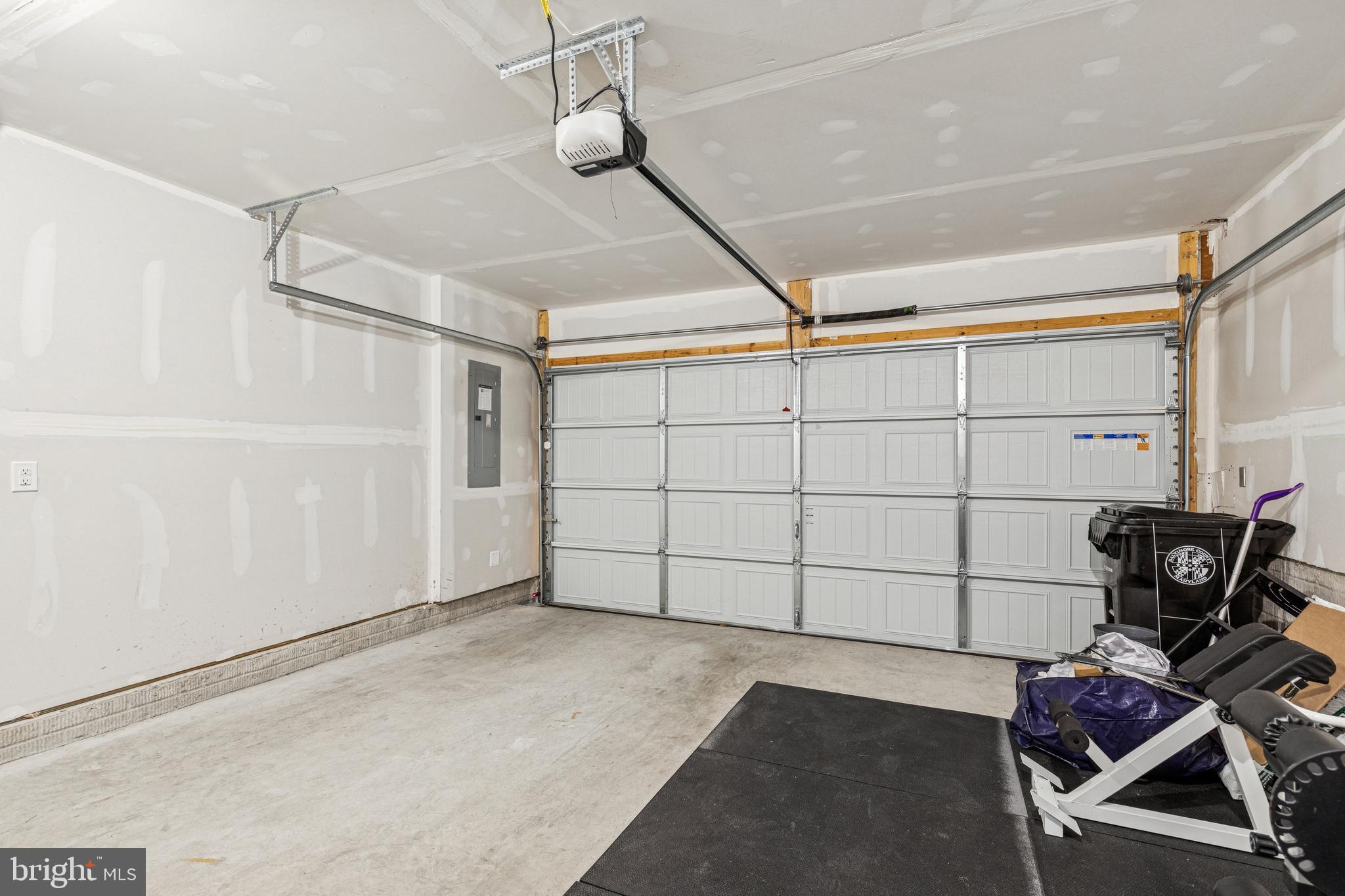 2218 Partin Road Baltimore, MD 21244 - Photo 53 of 62 a view of a garage with rack and white walls