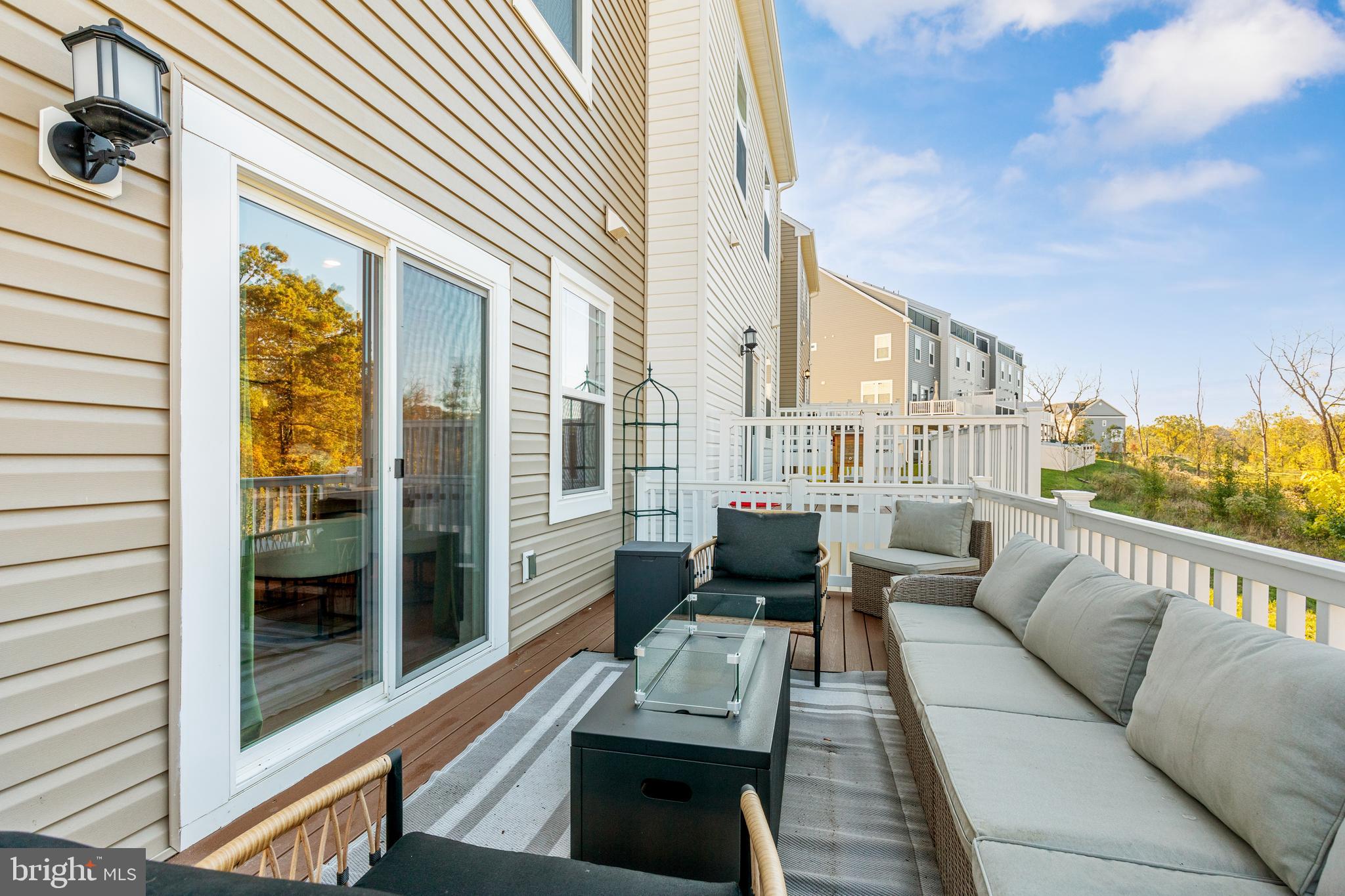 2218 Partin Road Baltimore, MD 21244 - Photo 55 of 62 a view of a balcony with couch and wooden floor
