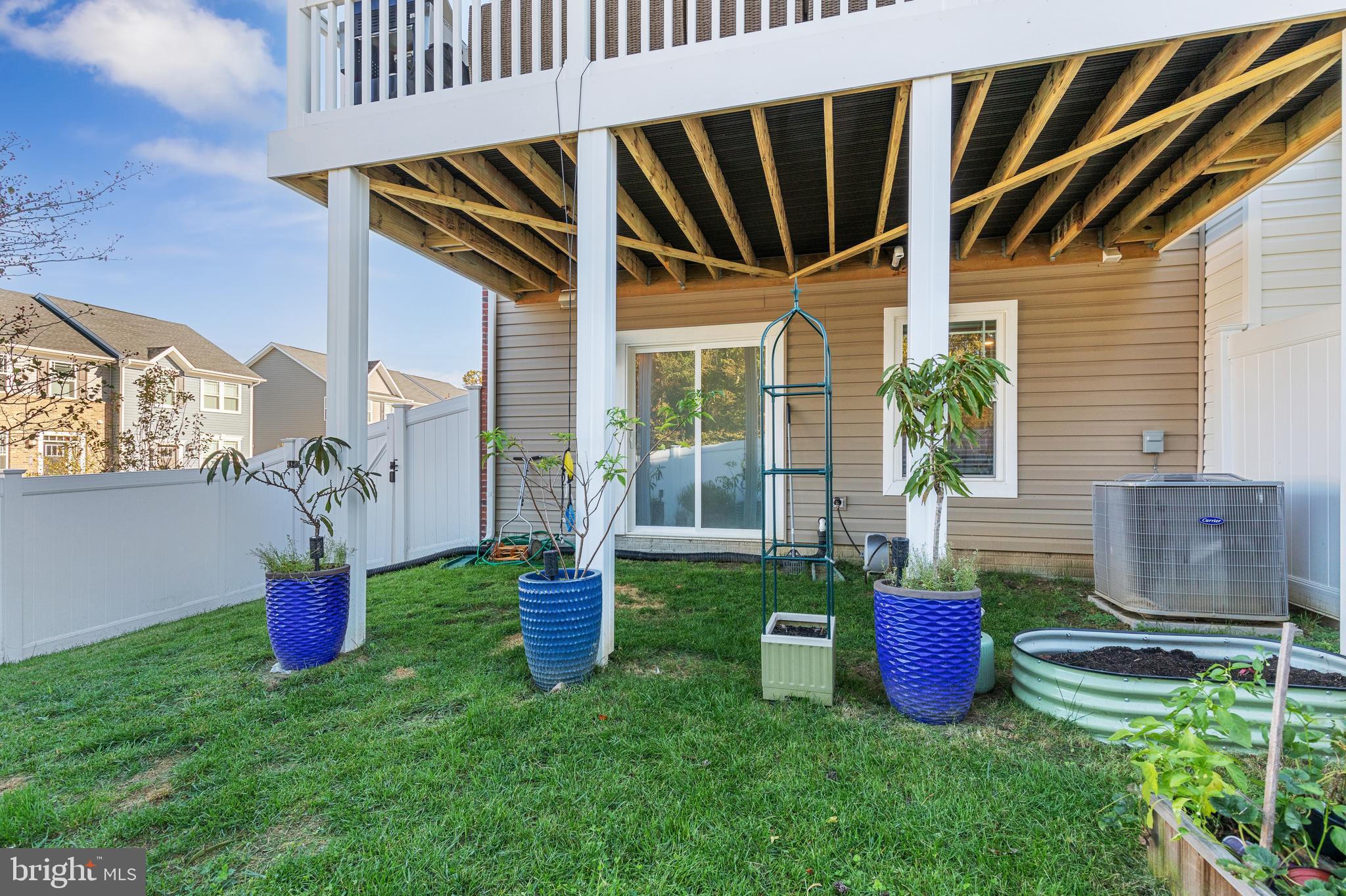 2218 Partin Road Baltimore, MD 21244 - Photo 62 of 62 a backyard of a house with table and chairs