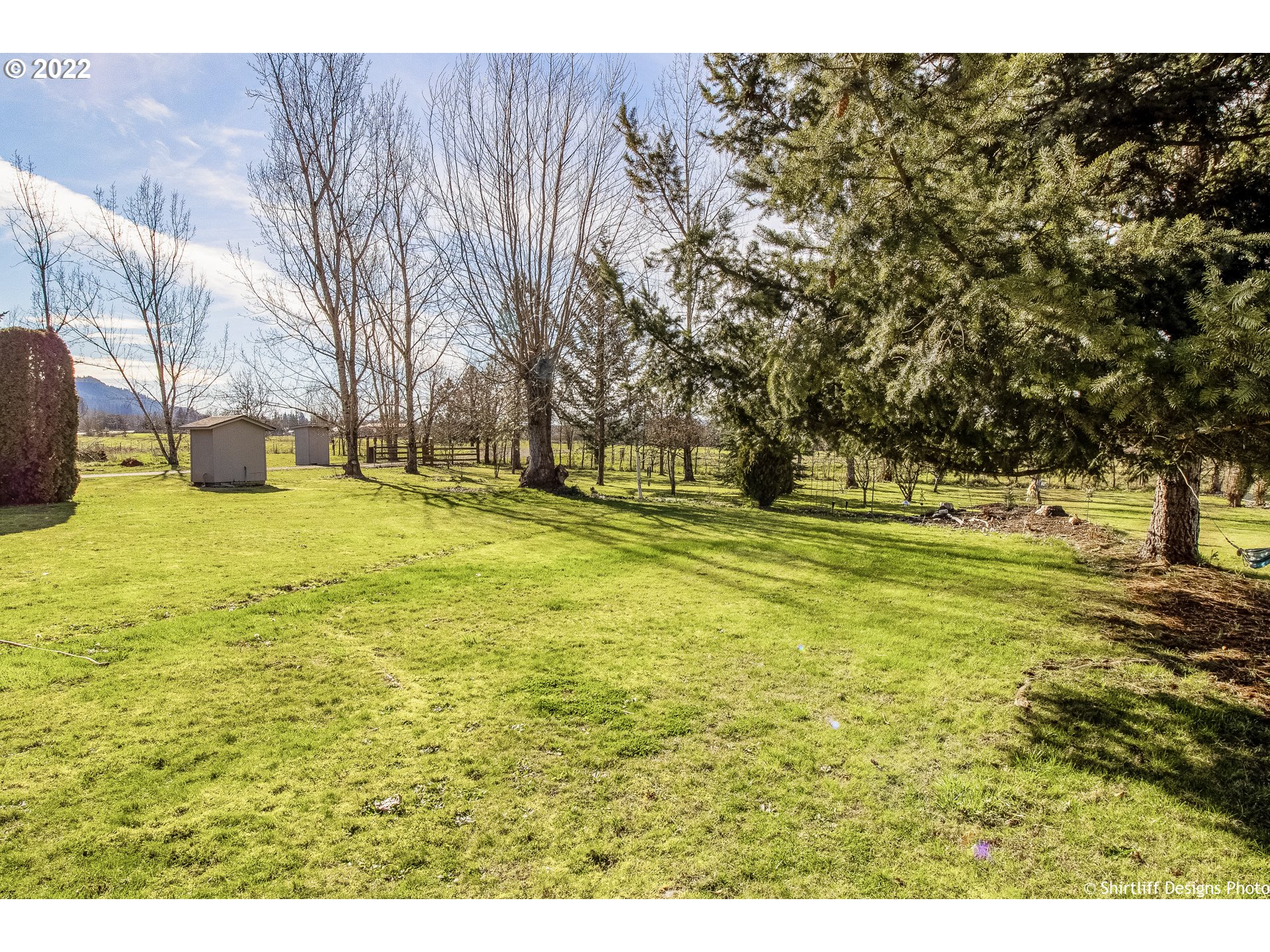 83553 Cloverdale Road Creswell, OR 97426 - Photo 13 of 17 a swimming pool with trees in the background
