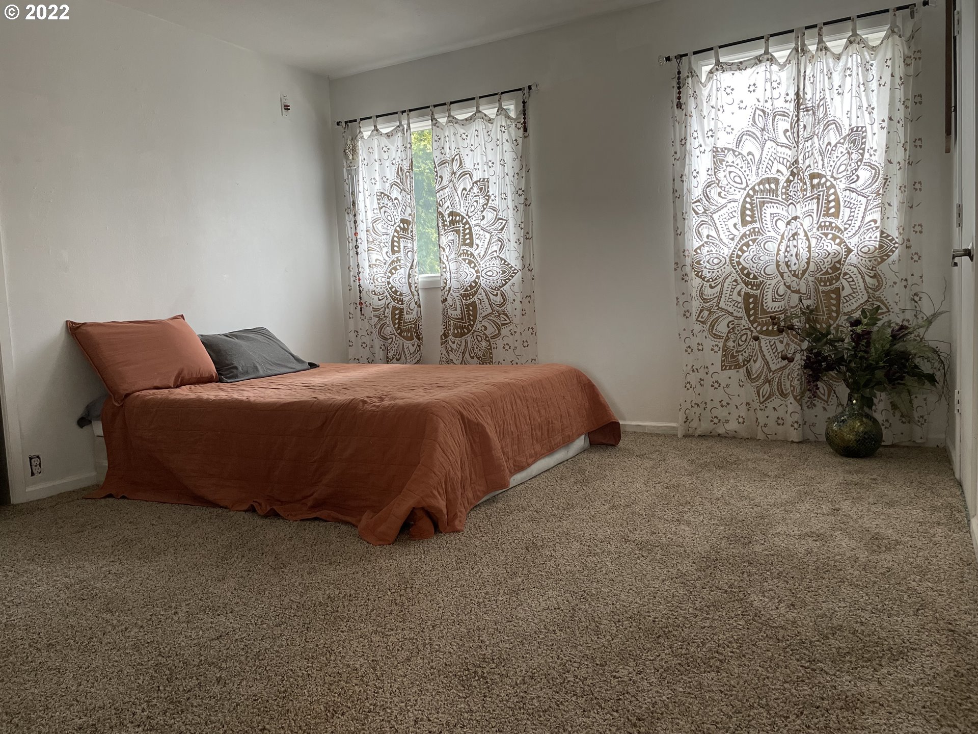 83553 Cloverdale Road Creswell, OR 97426 - Photo 17 of 17 a bedroom with a bed and a window