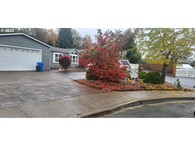 a view of a porch with a table and chairs