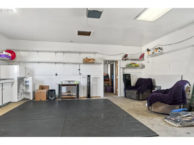 a view of entryway with a lot of stuff and furniture