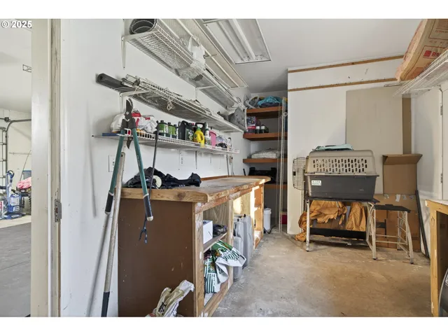 a view of a porch with potted plants