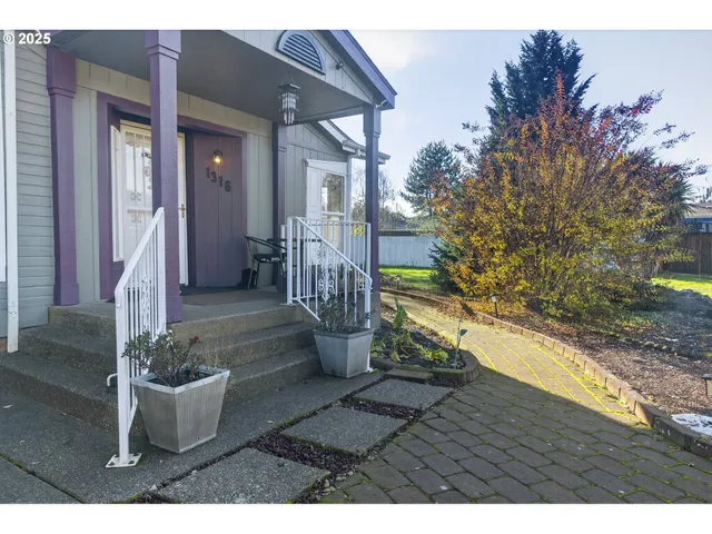 a view of a backyard with a garden