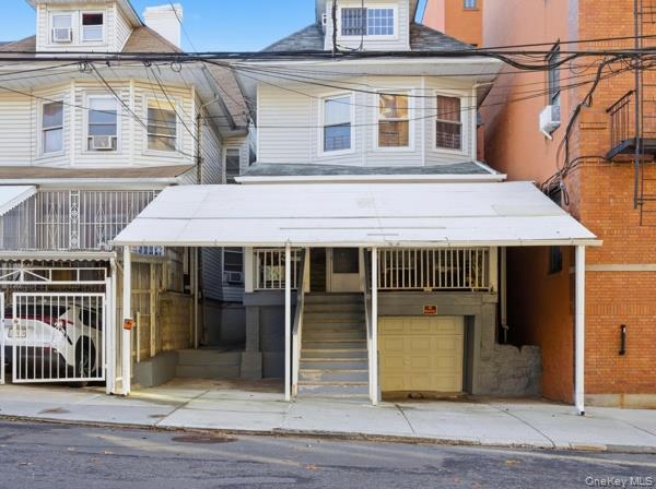 a view of a house with wooden floor and a window