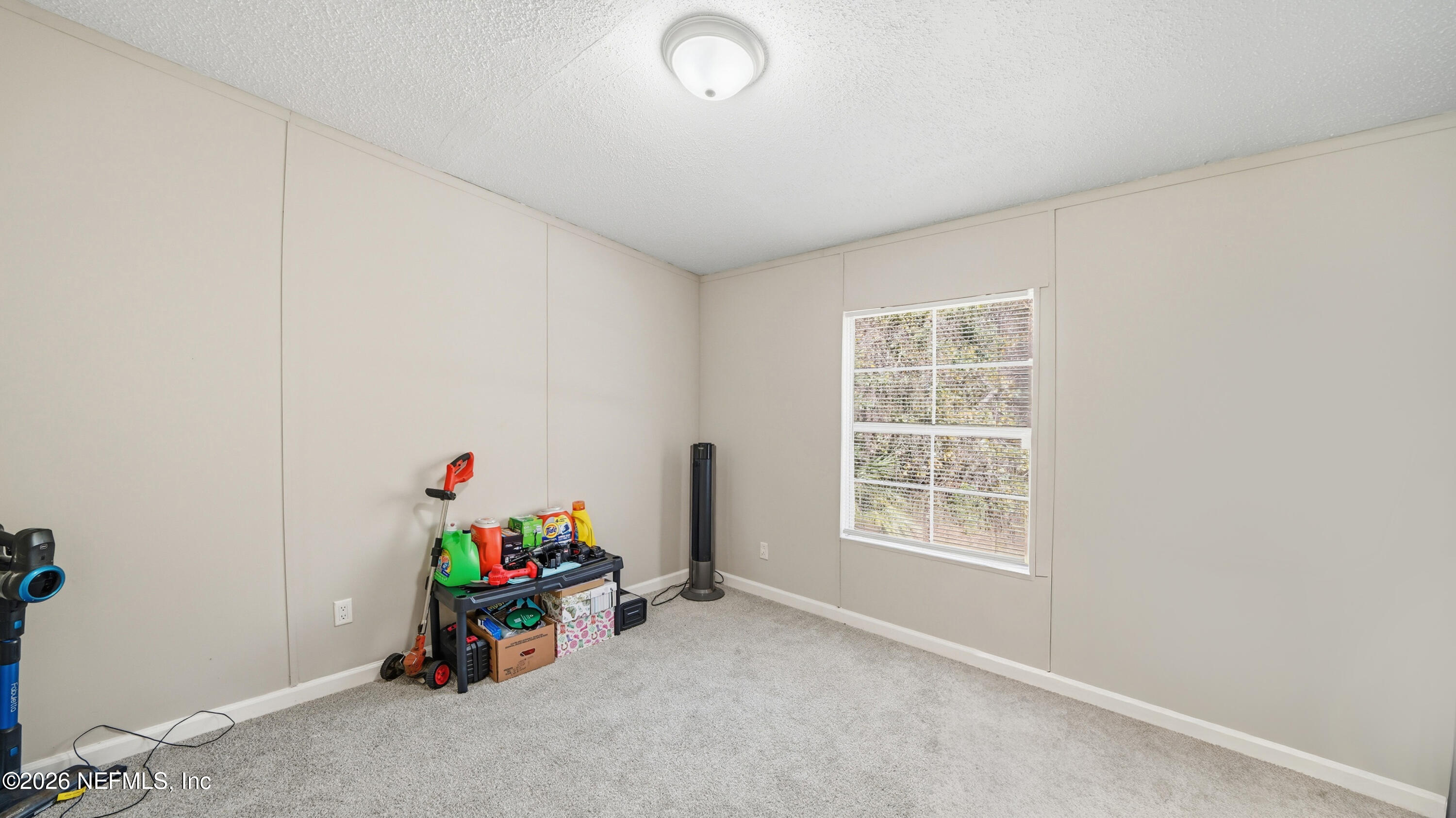 85324 Lil William Road Fernandina Beach, FL 32034 - Photo 24 of 36 a view of an empty room with a window