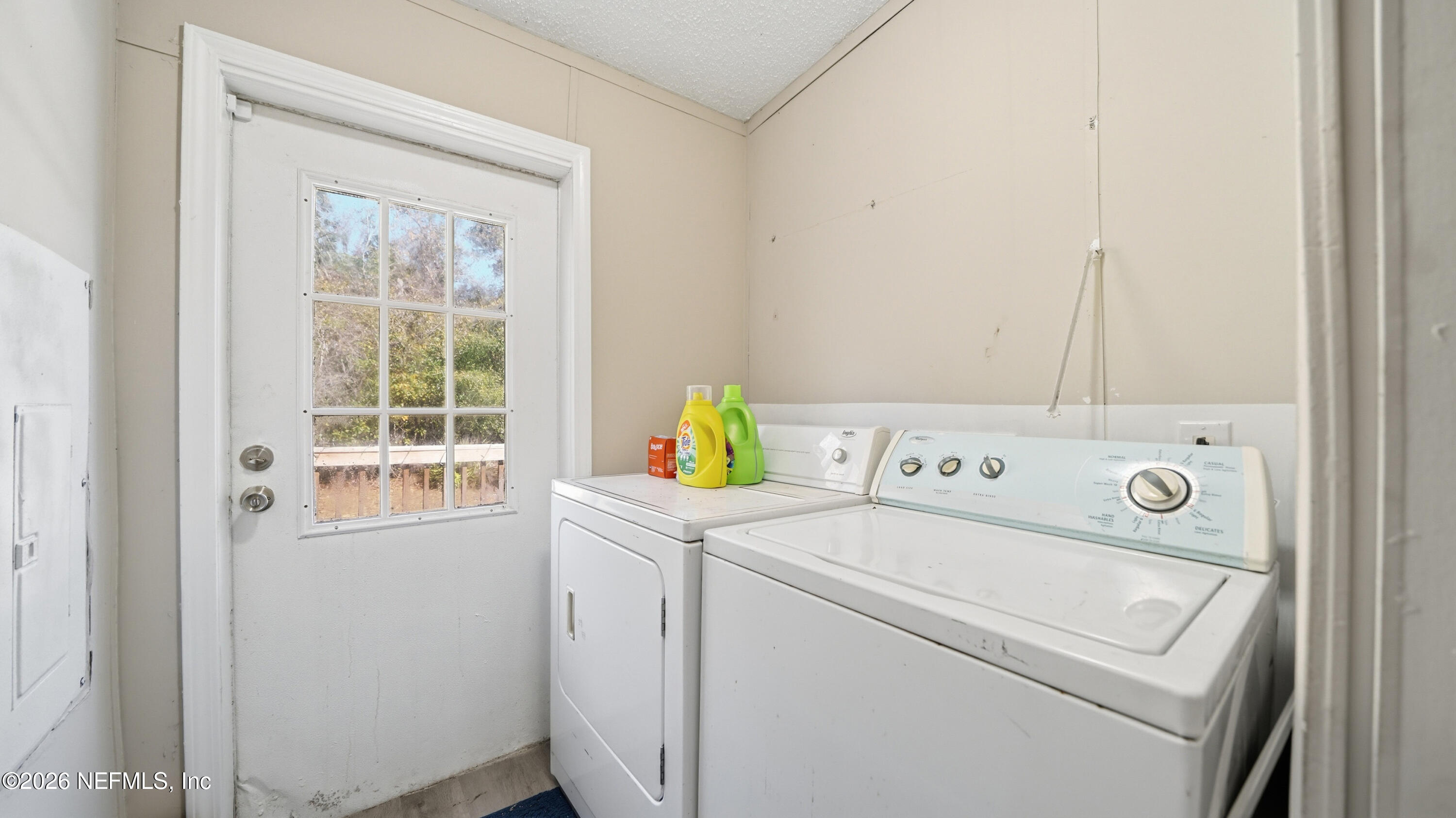 85324 Lil William Road Fernandina Beach, FL 32034 - Photo 26 of 36 a utility room with dryer and washer