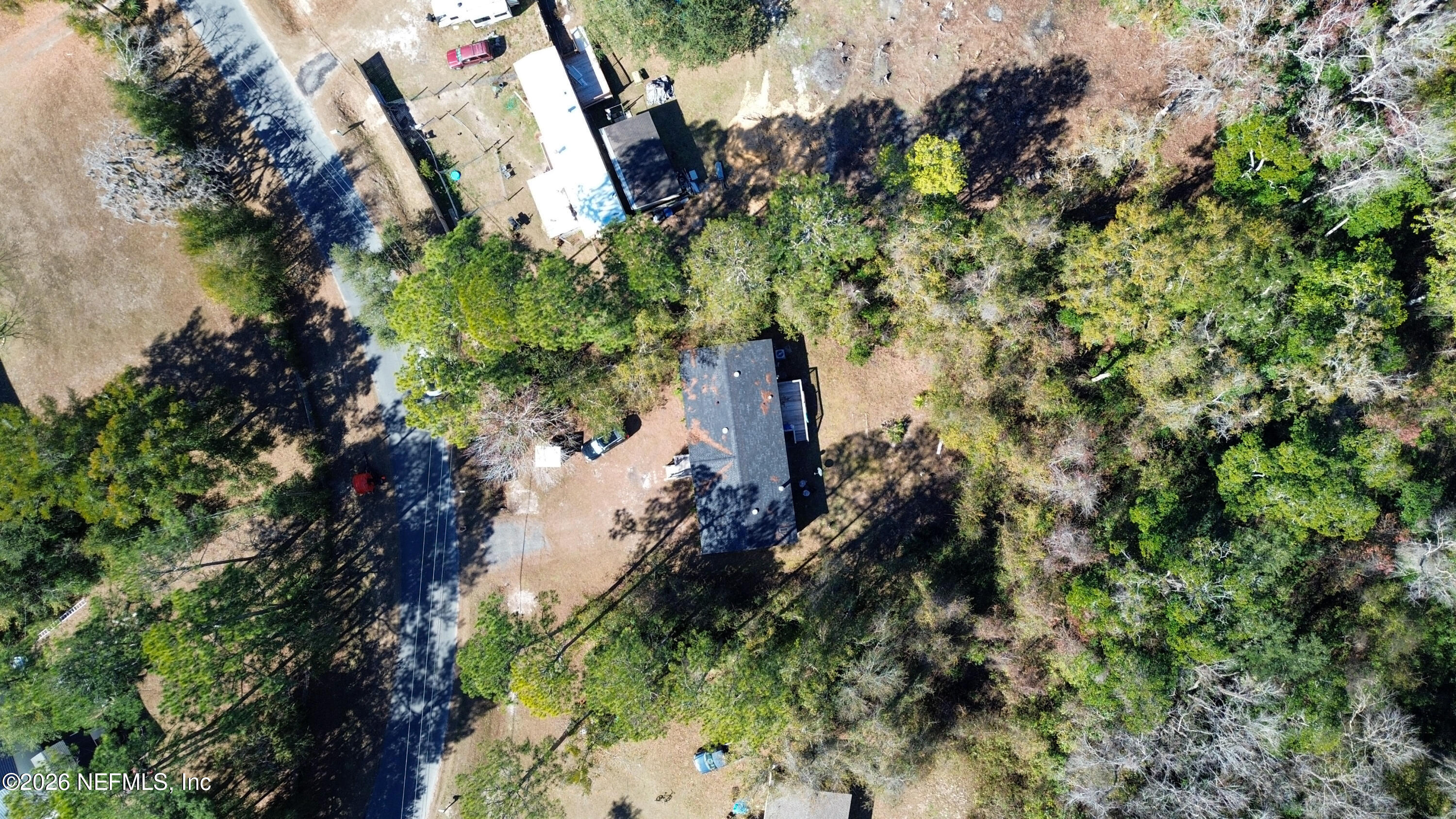 85324 Lil William Road Fernandina Beach, FL 32034 - Photo 34 of 36 an aerial view of a residential houses with yard