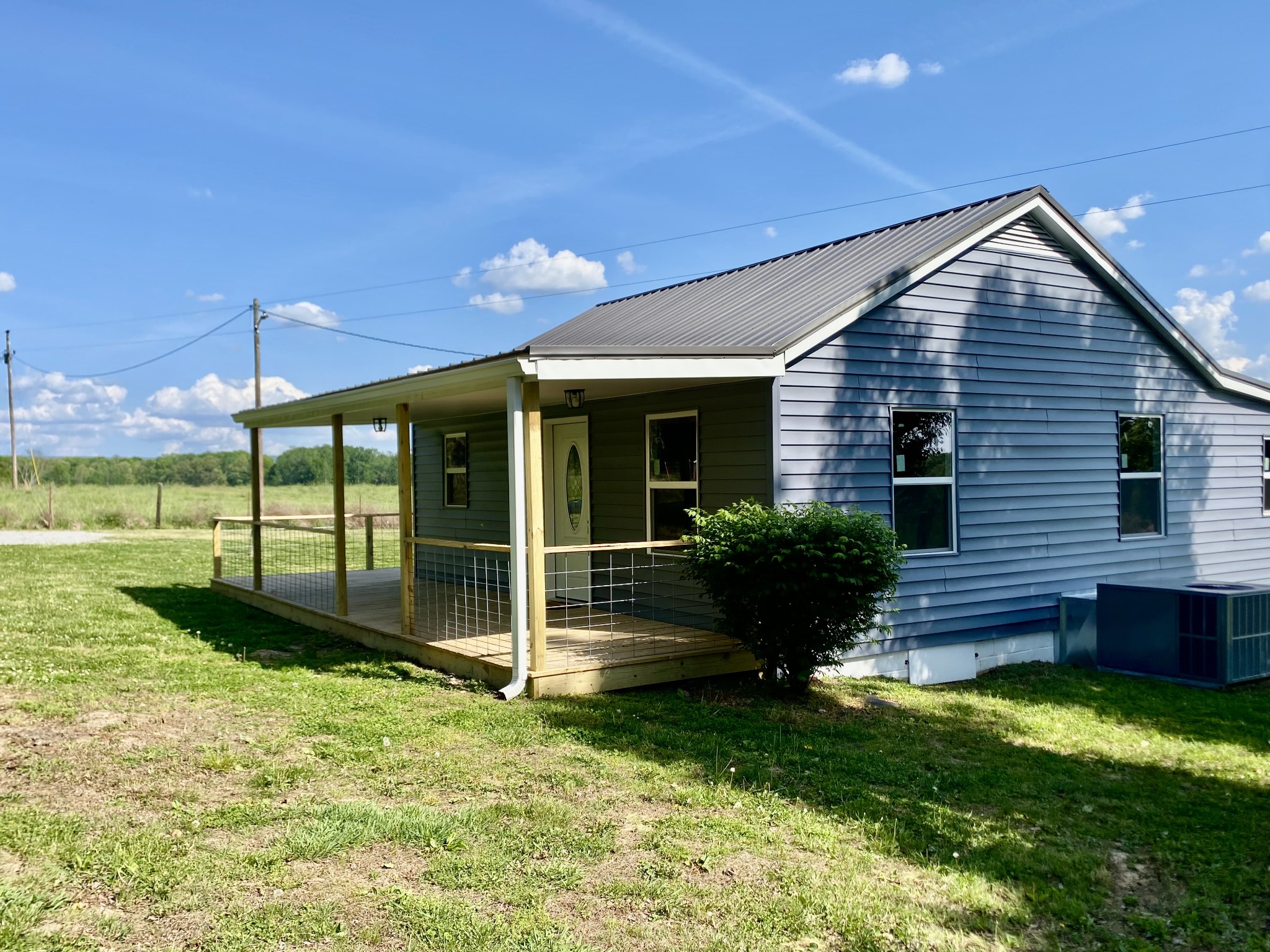 2471 Smartt Station Road Morrison, TN 37357 - Photo 31 of 38 a view of a house with backyard