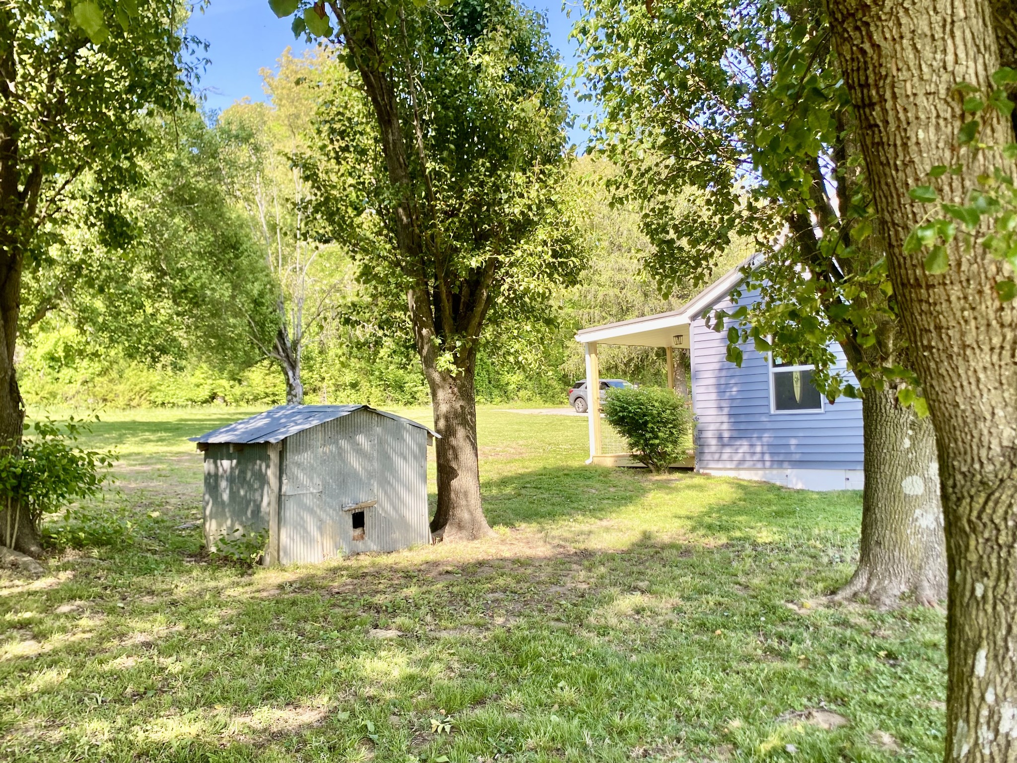 2471 Smartt Station Road Morrison, TN 37357 - Photo 33 of 38 front view of a house with a yard