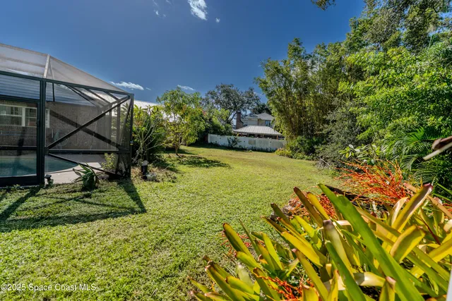 a view of swimming pool from a lake view