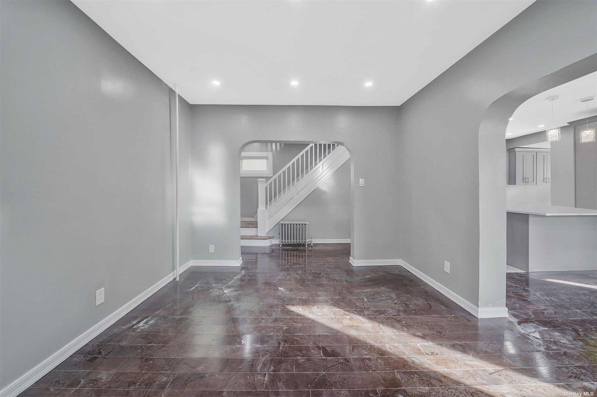 247-14 137th Road Queens, NY 11422 - Photo 11 of 34 a view of entryway and hall with a door