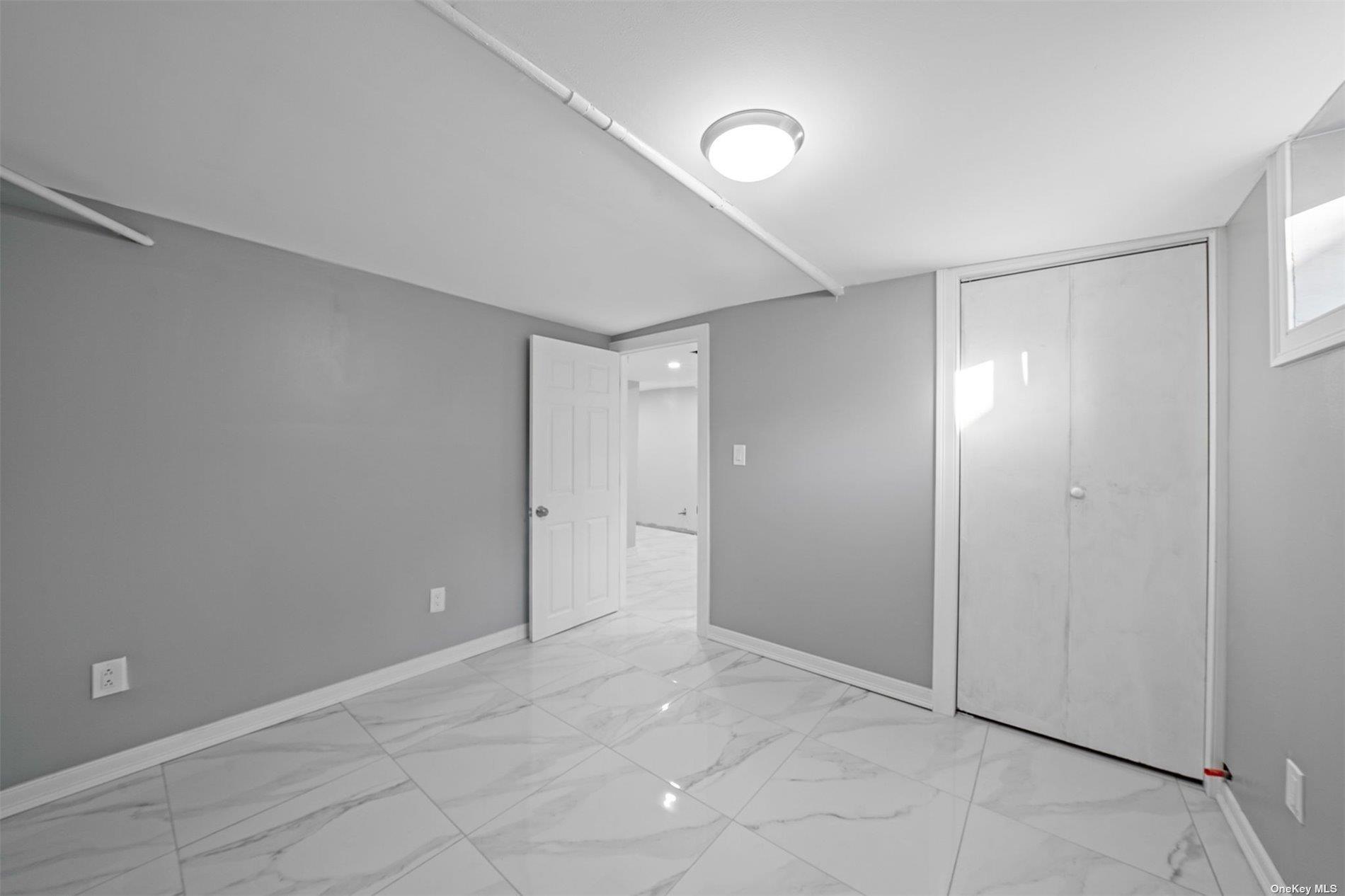 247-14 137th Road Queens, NY 11422 - Photo 17 of 34 a view of an empty room