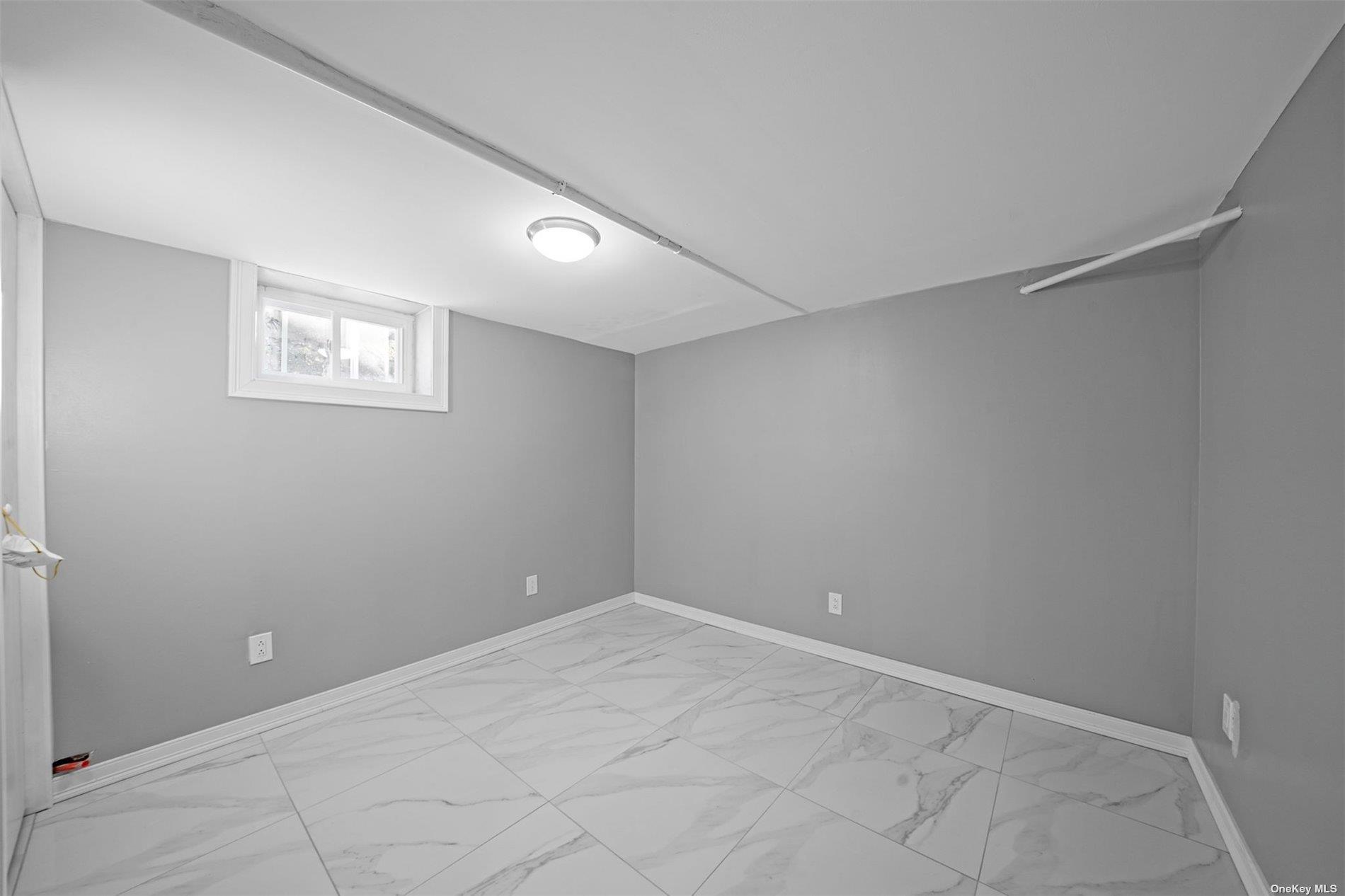 247-14 137th Road Queens, NY 11422 - Photo 18 of 34 a view of a big room with closet and bathroom