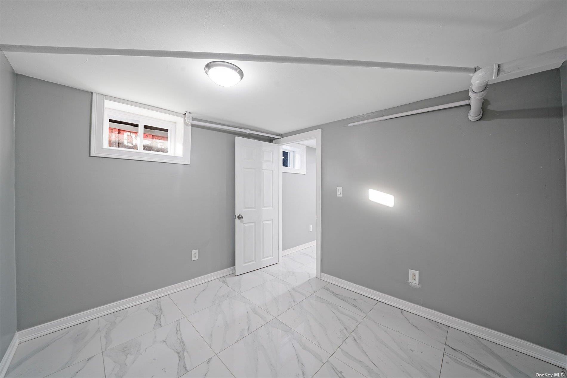 247-14 137th Road Queens, NY 11422 - Photo 20 of 34 a view of a hallway