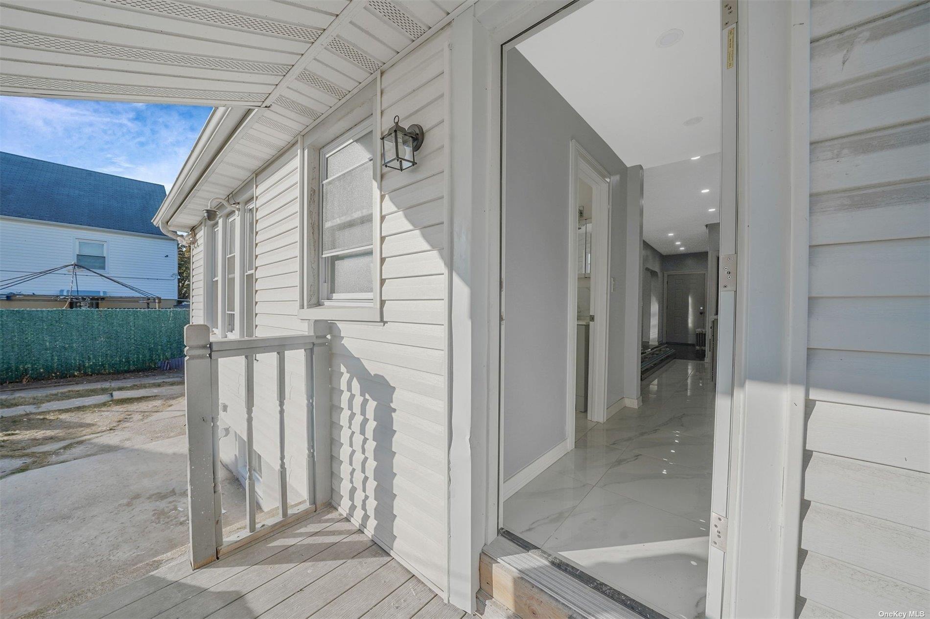 247-14 137th Road Queens, NY 11422 - Photo 28 of 34 a view of entryway with a front door