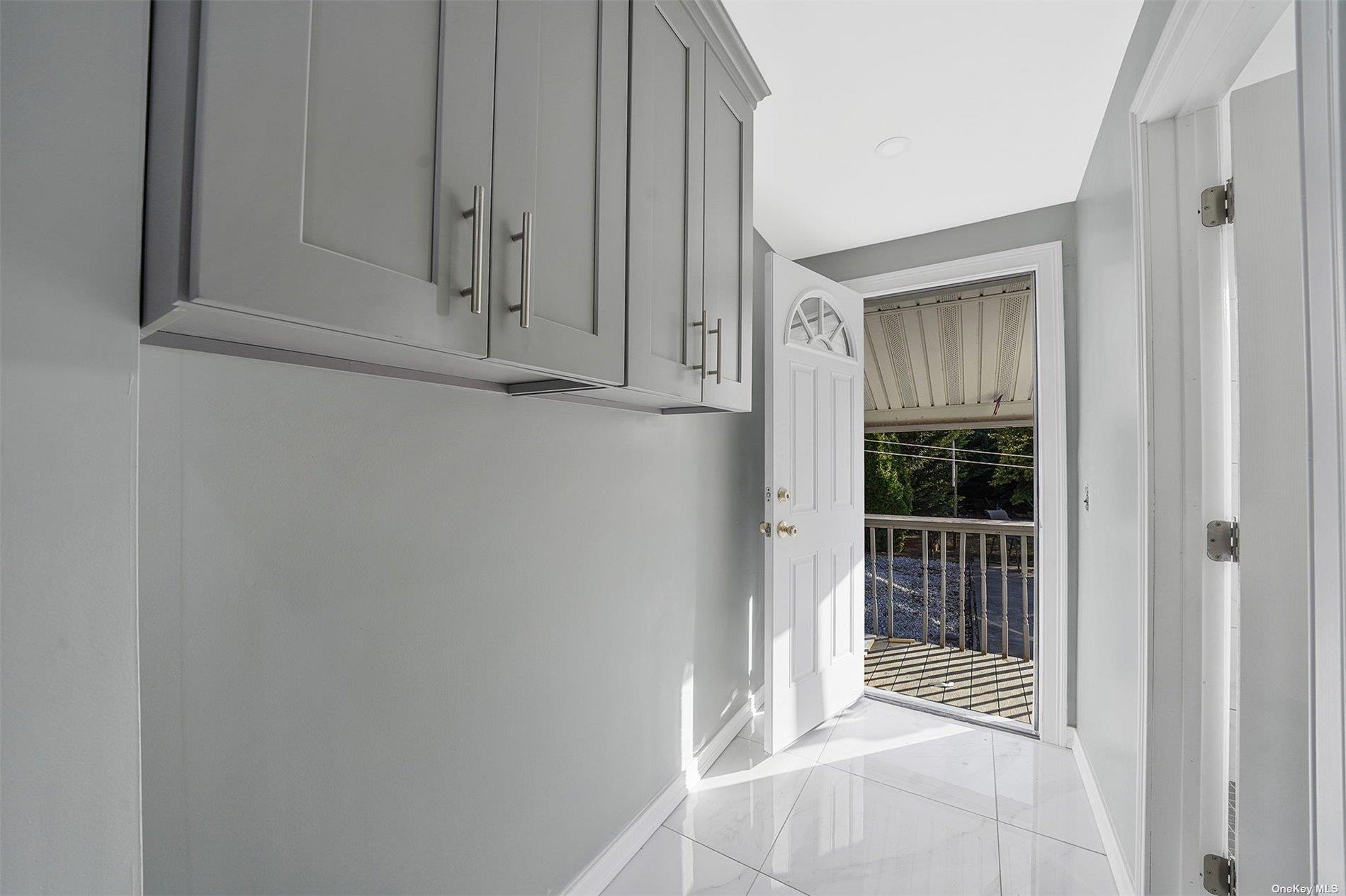 247-14 137th Road Queens, NY 11422 - Photo 29 of 34 a view of wooden door and entryway
