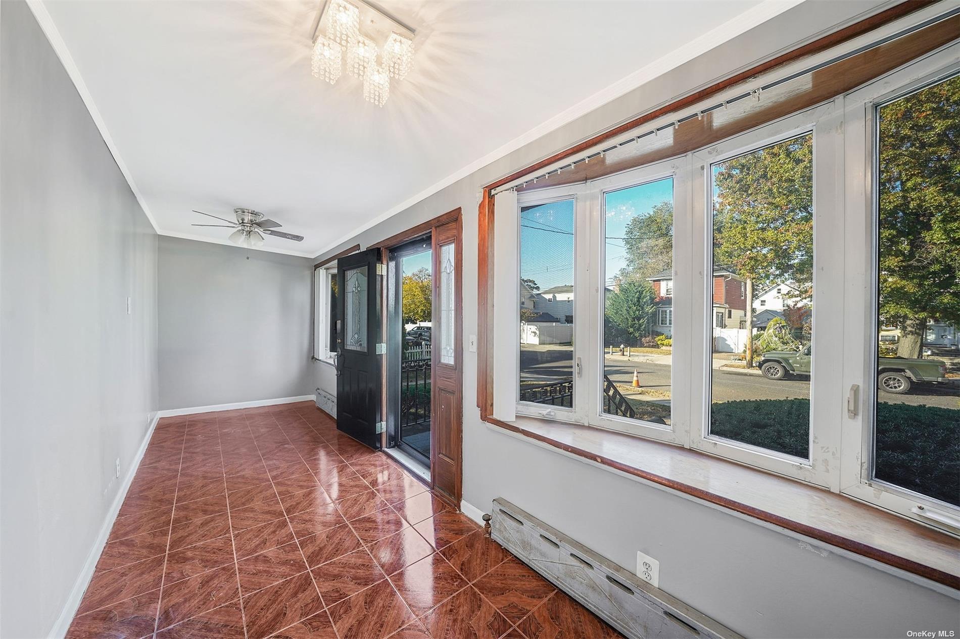 247-14 137th Road Queens, NY 11422 - Photo 4 of 34 a view of hallway with windows