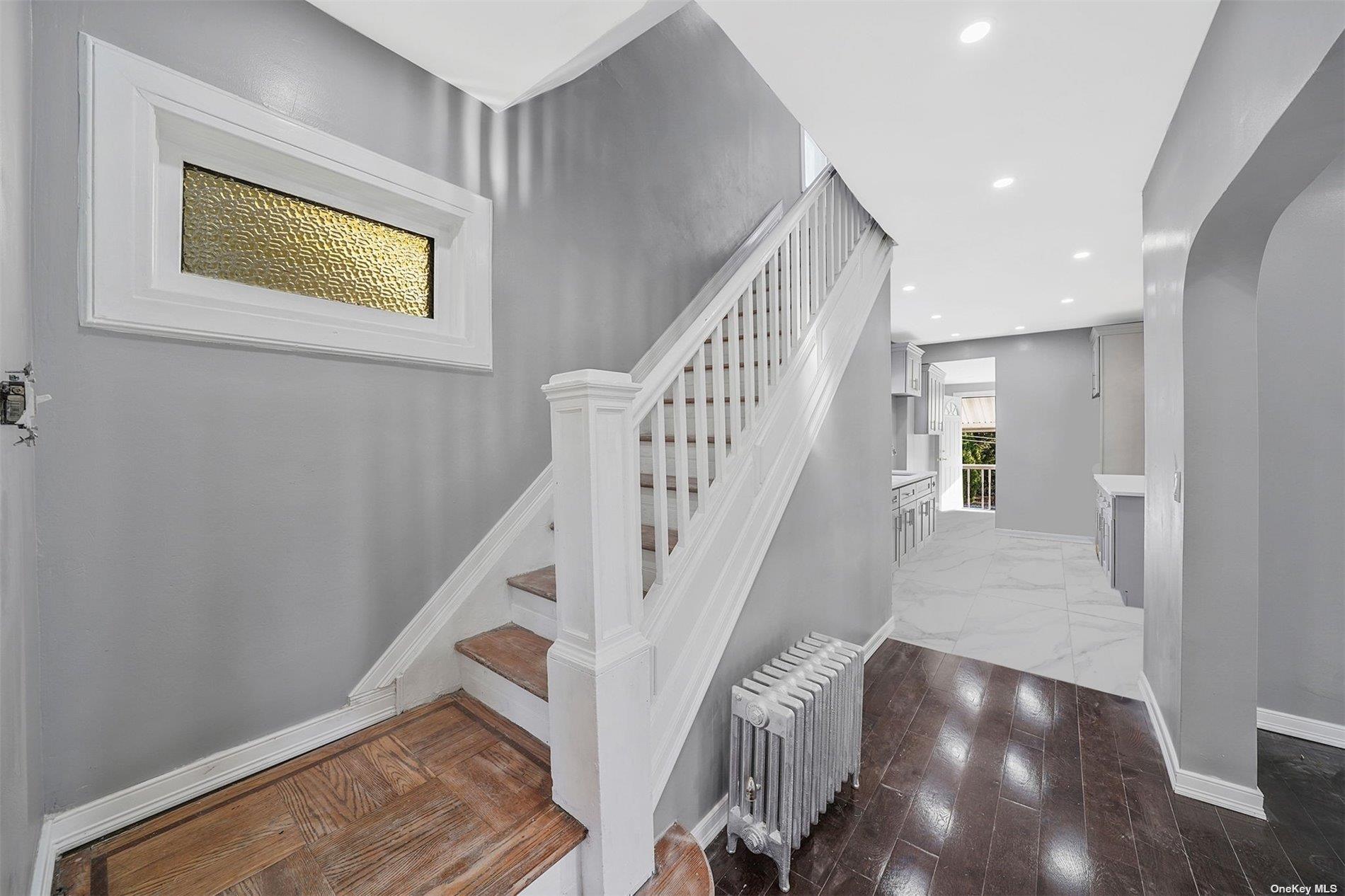 247-14 137th Road Queens, NY 11422 - Photo 5 of 34 a view of entryway and hall with wooden floor